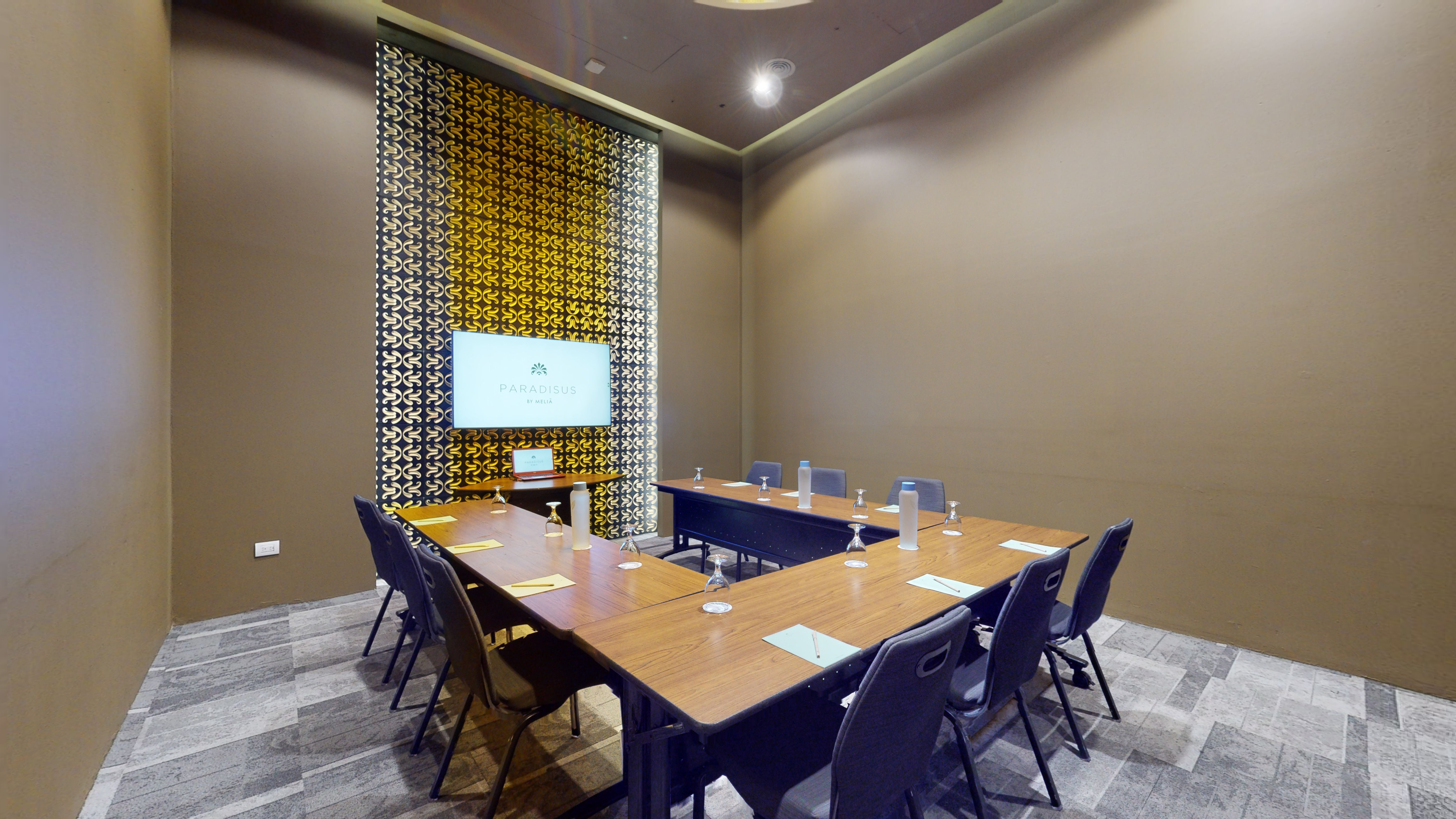 a room with a table and chairs