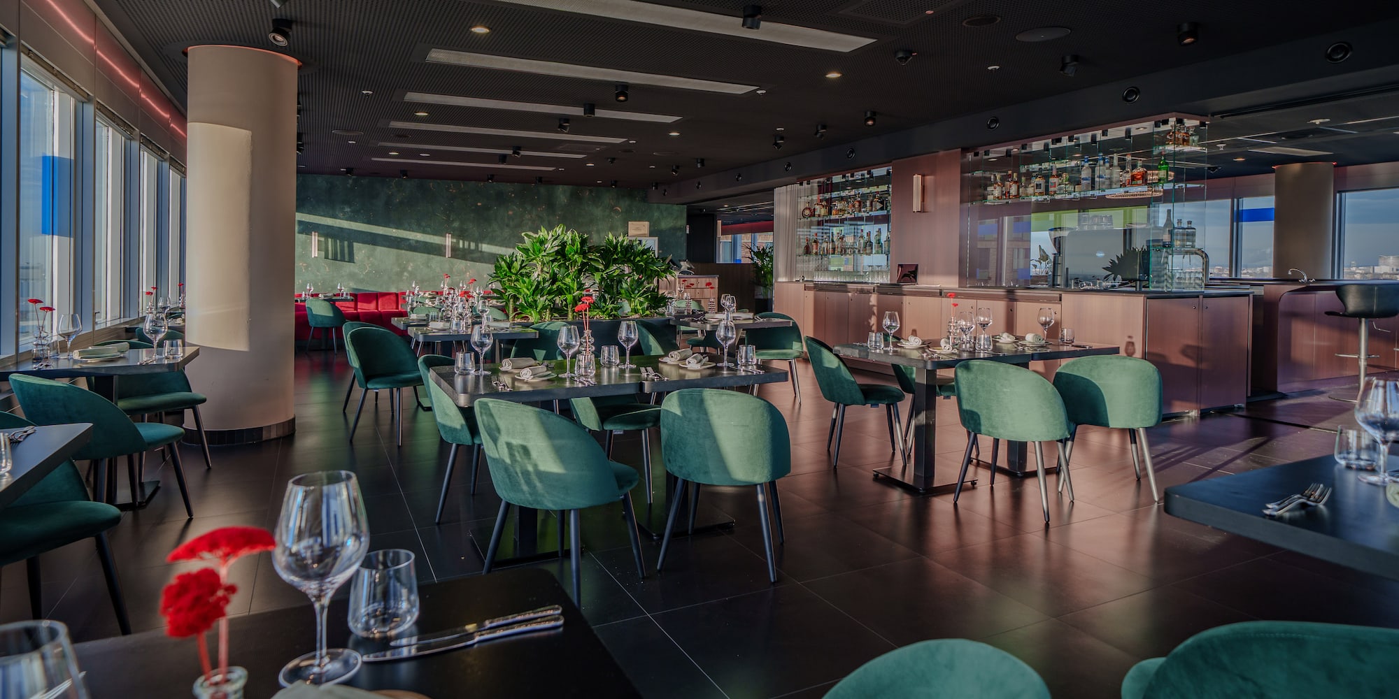 a restaurant with tables and chairs