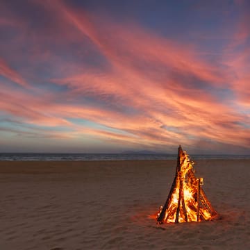 a bonfire on a beach