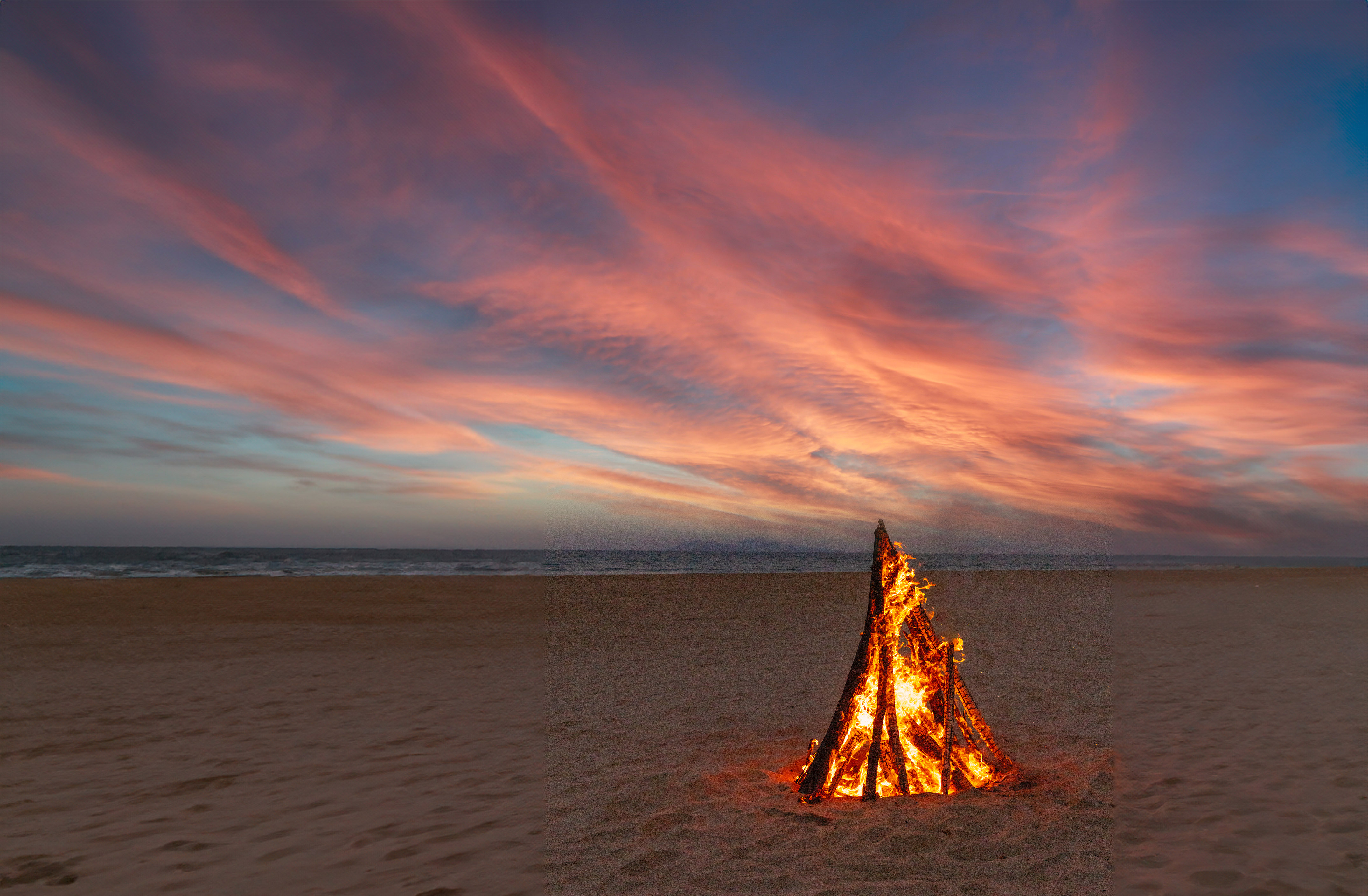 a bonfire on a beach
