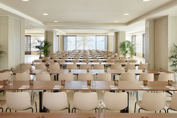 a room with tables and chairs