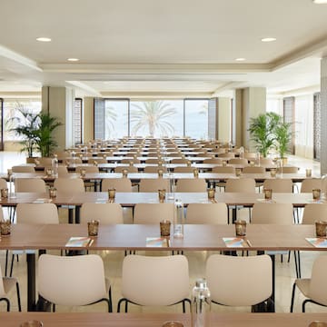 a room with tables and chairs