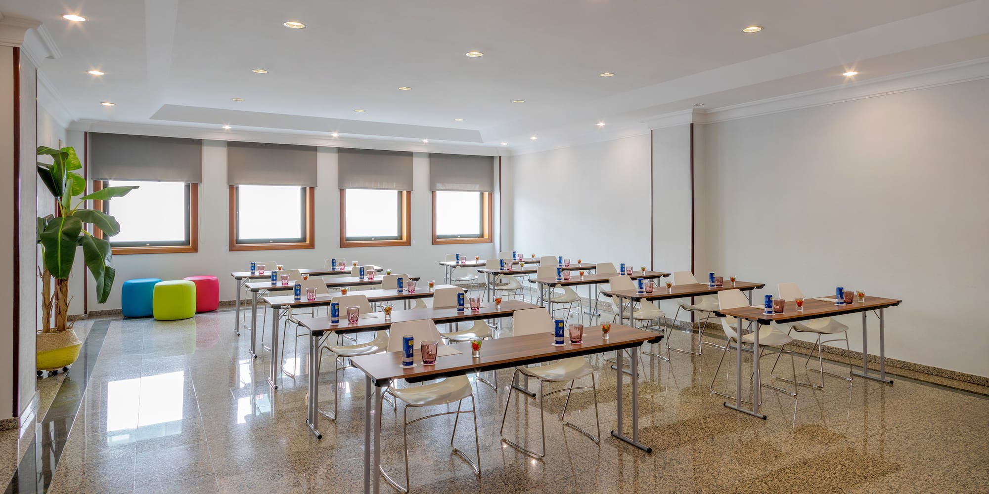 a room with tables and chairs