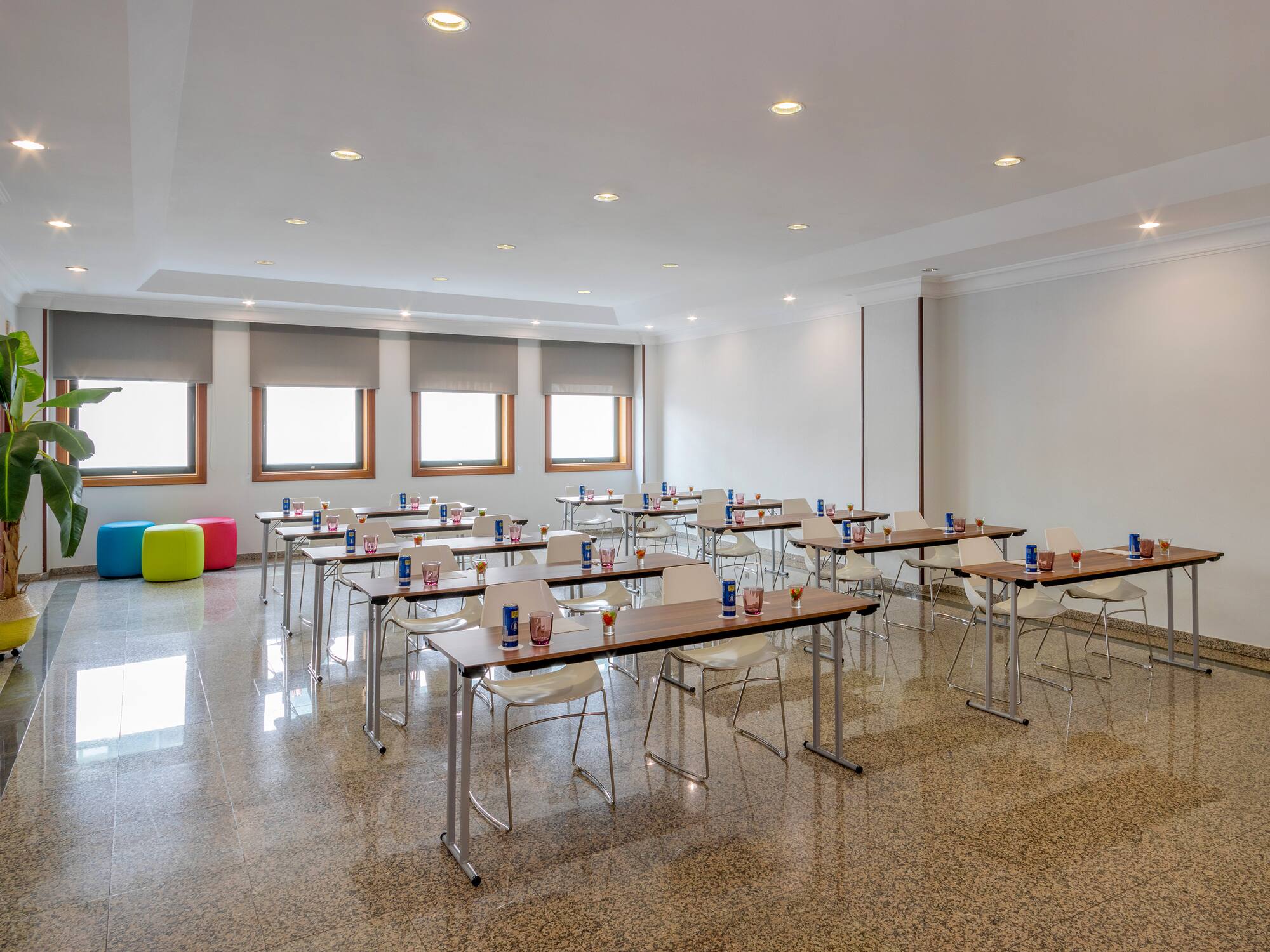 a room with tables and chairs