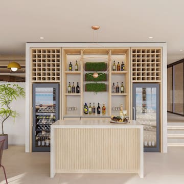 a wine cellar with a bar and shelves