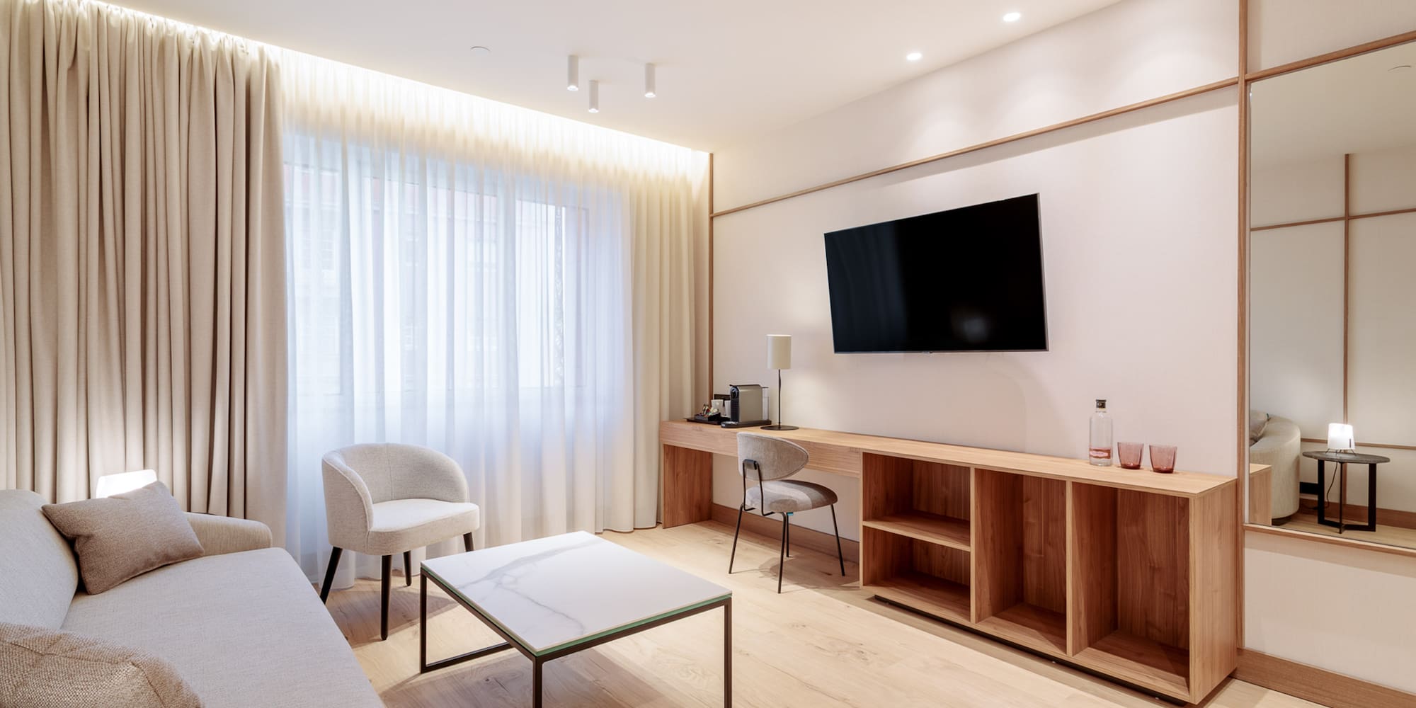 a room with a tv and a table