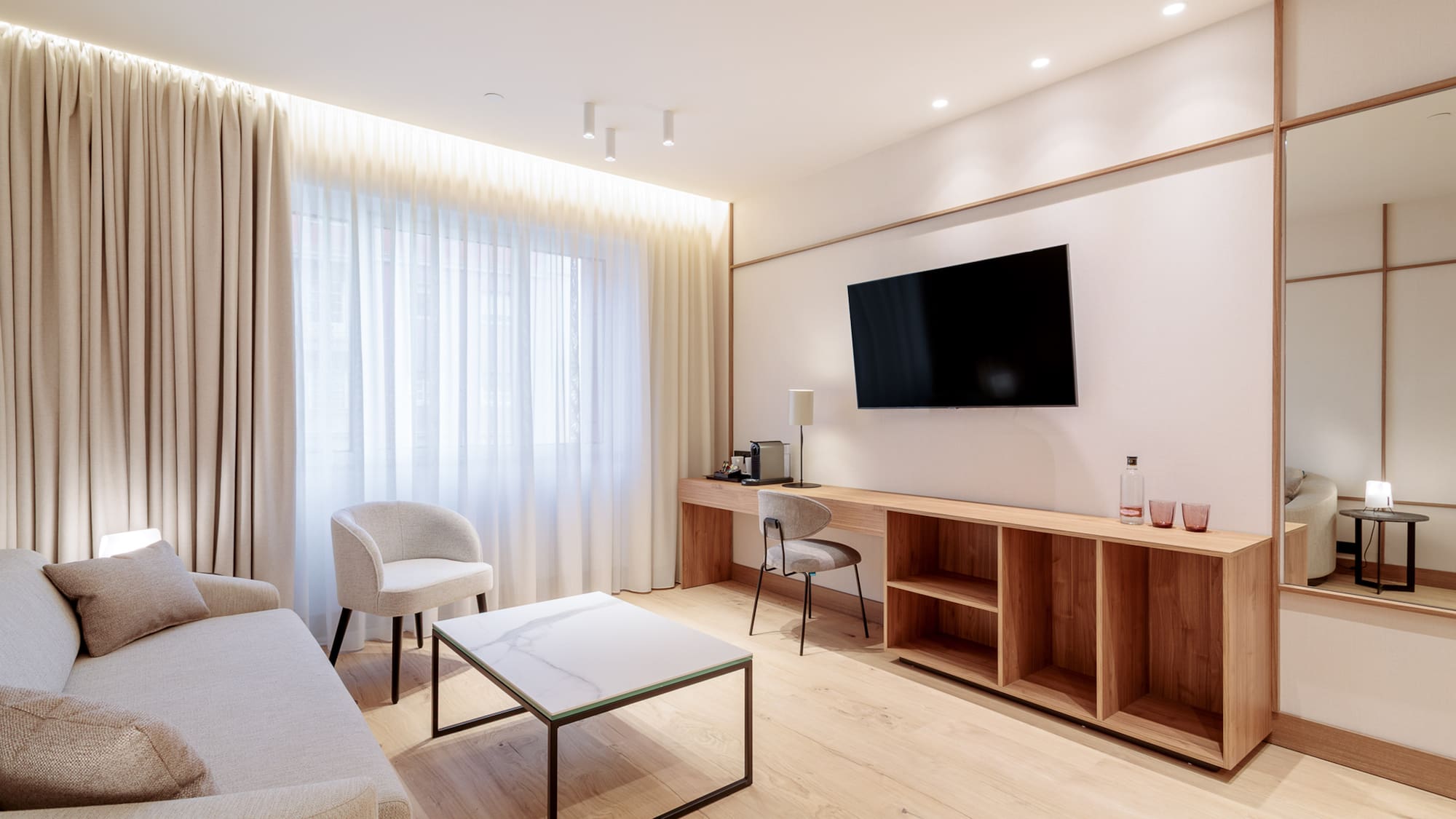 a room with a tv and a table