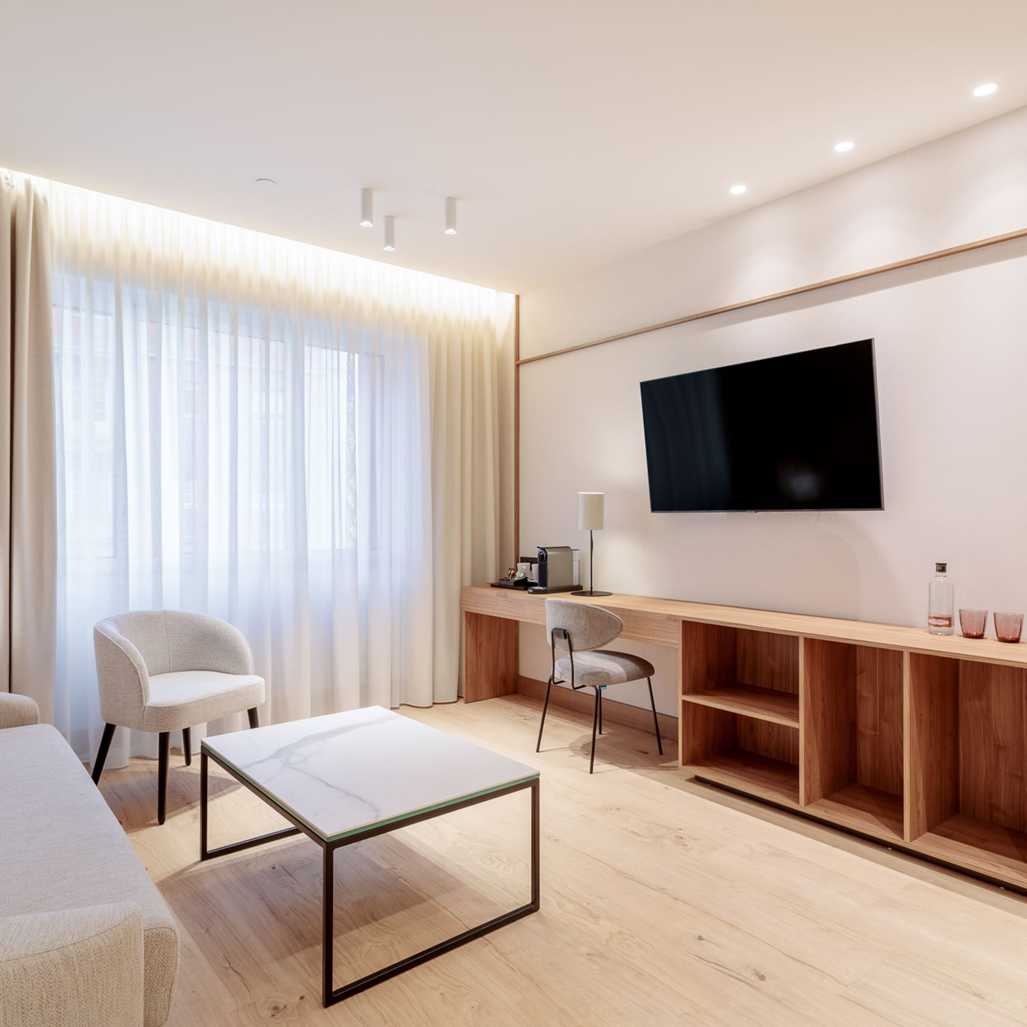 a room with a tv and a table