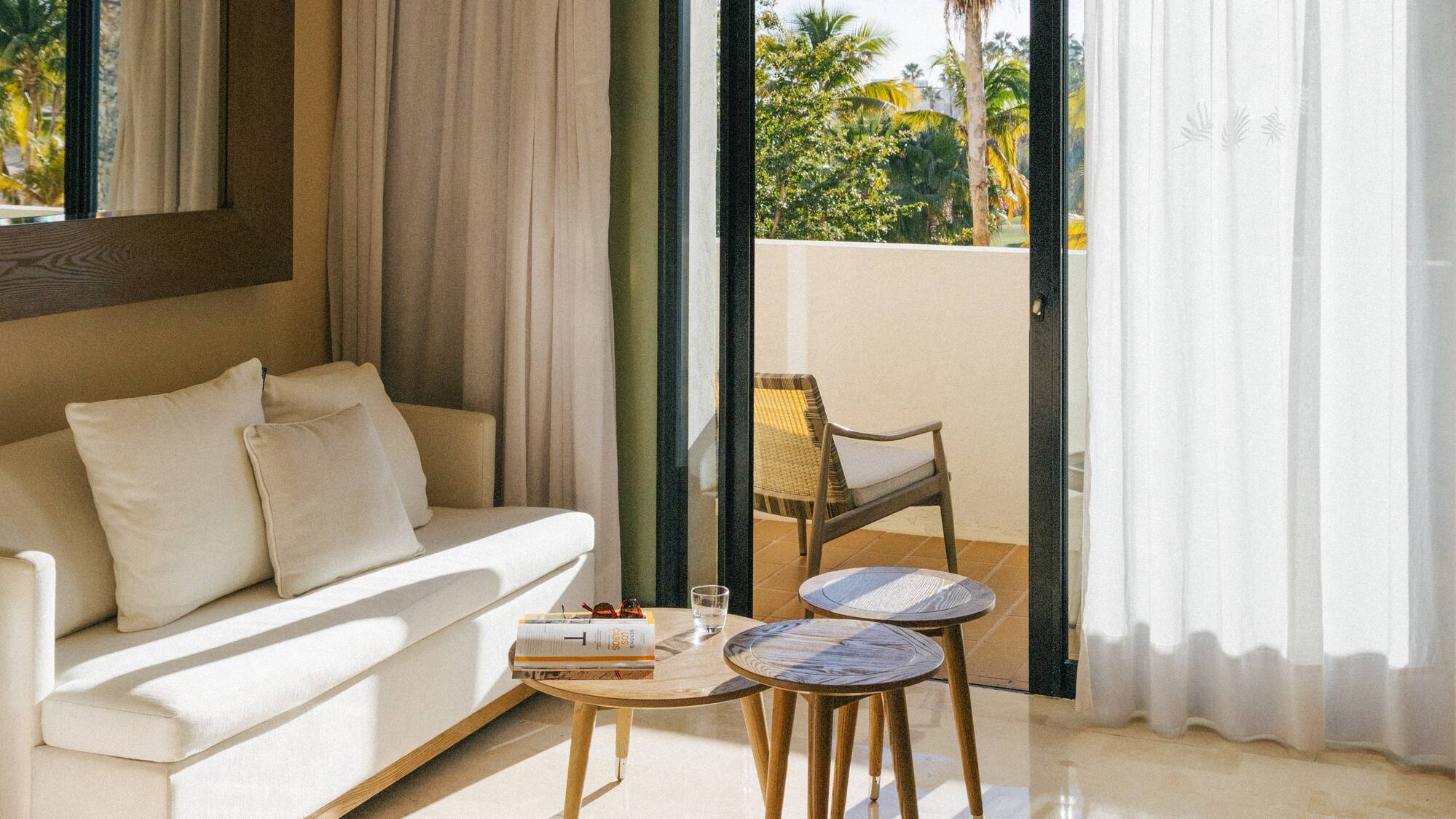 a room with a couch and a sofa