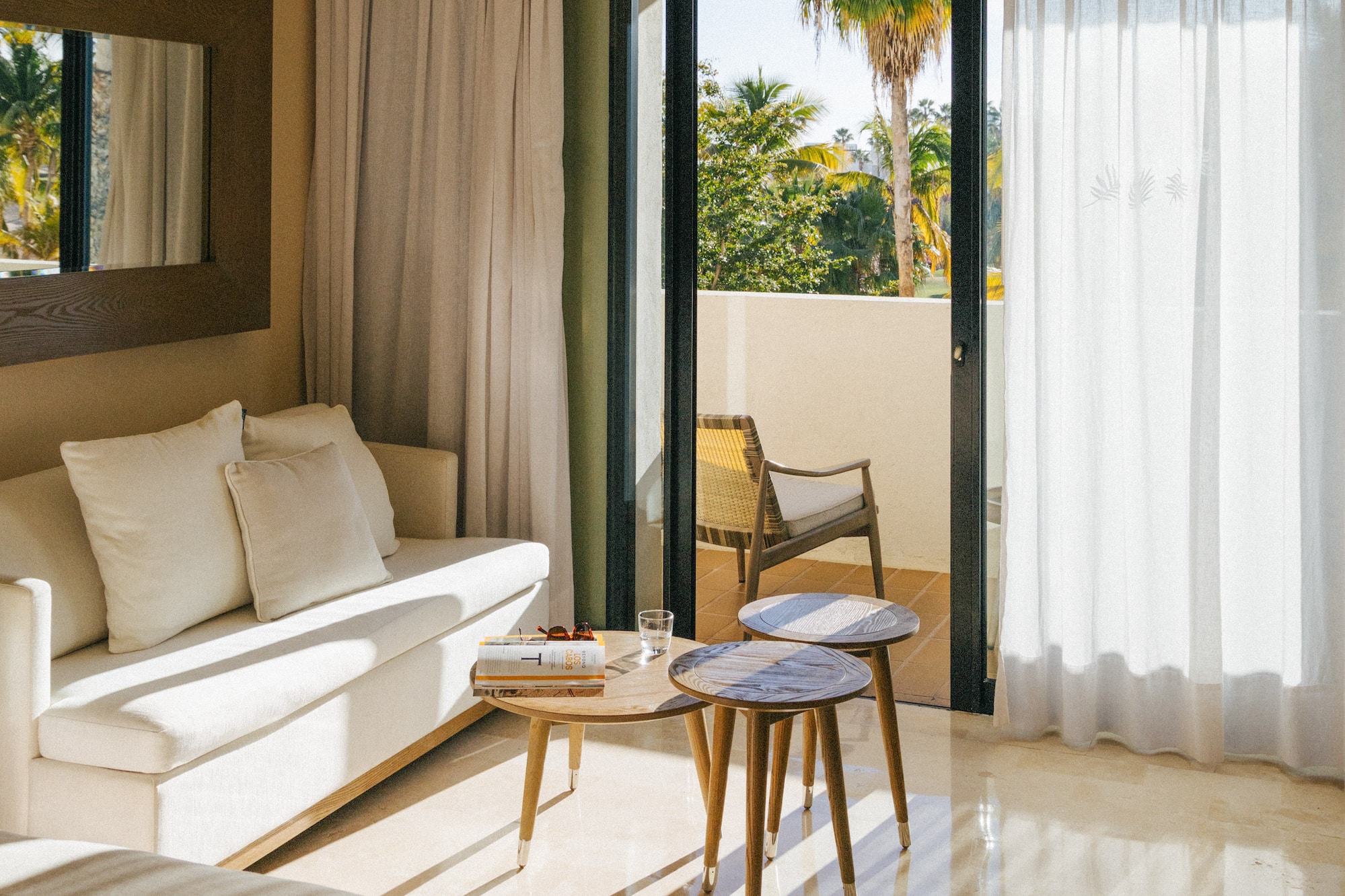 a room with a couch and a sofa