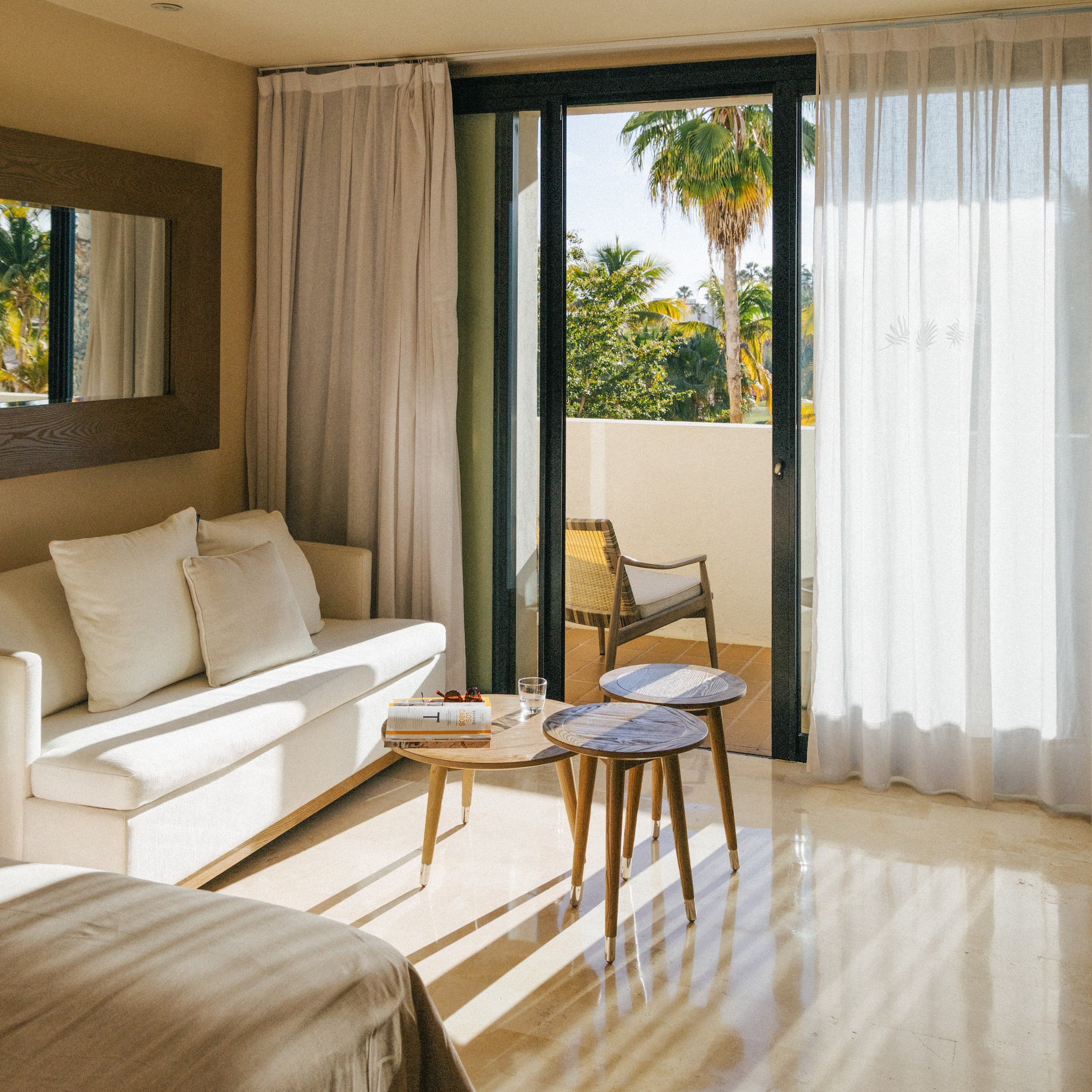 a room with a couch and a sofa