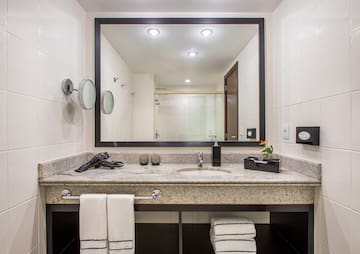 a bathroom with a mirror and a sink