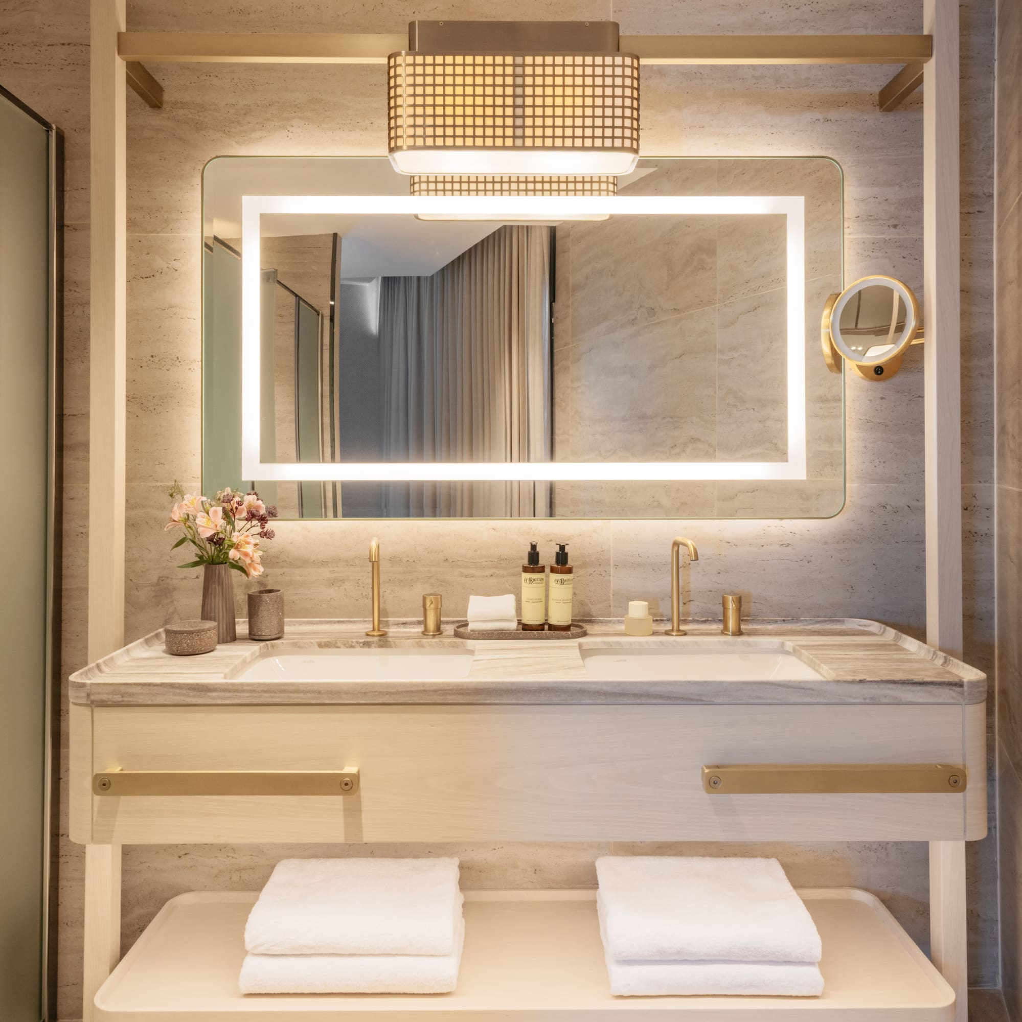 a bathroom with a mirror and sink