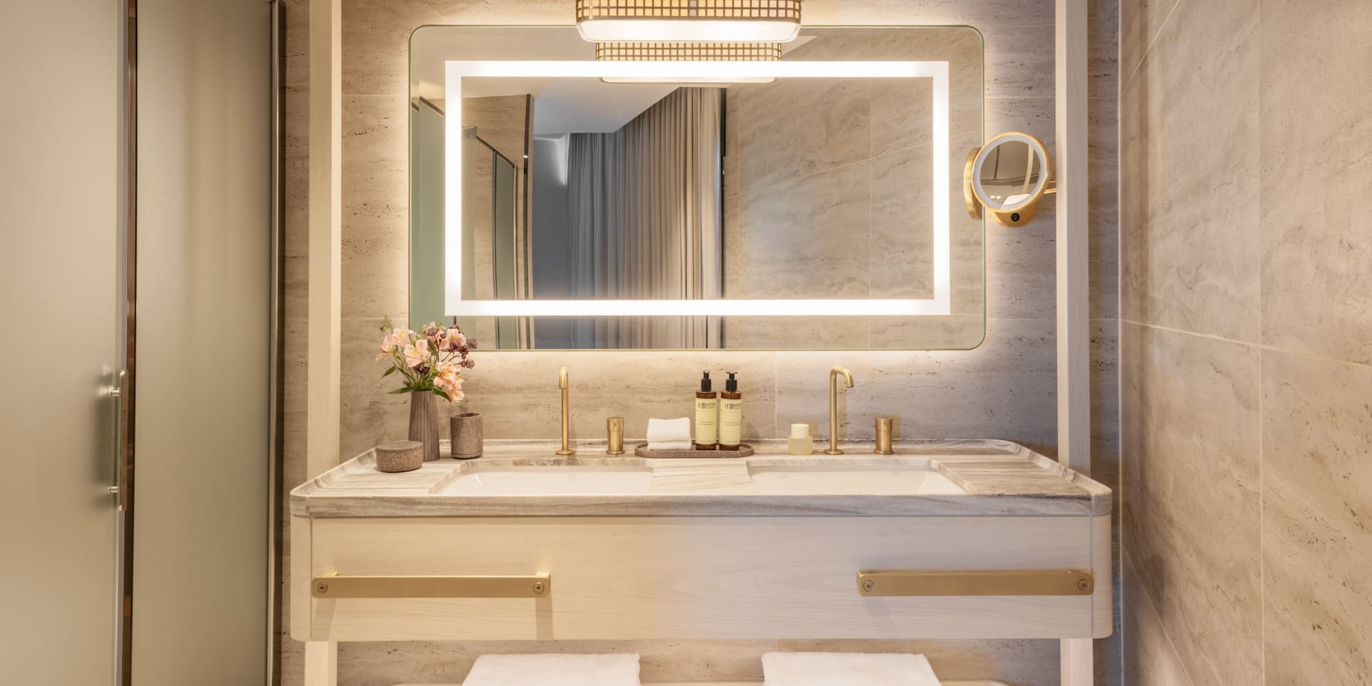 a bathroom with a mirror and sink