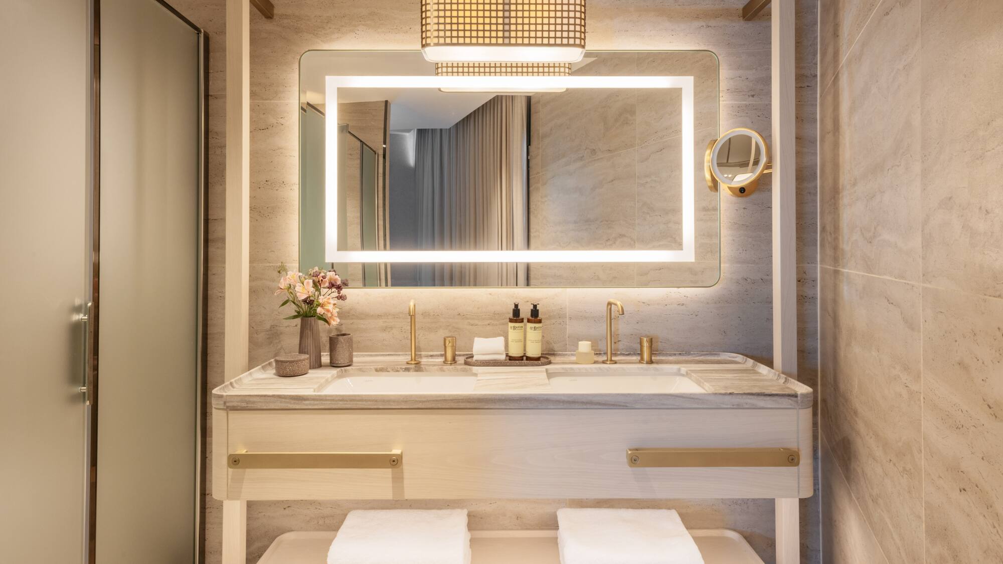 a bathroom with a mirror and sink