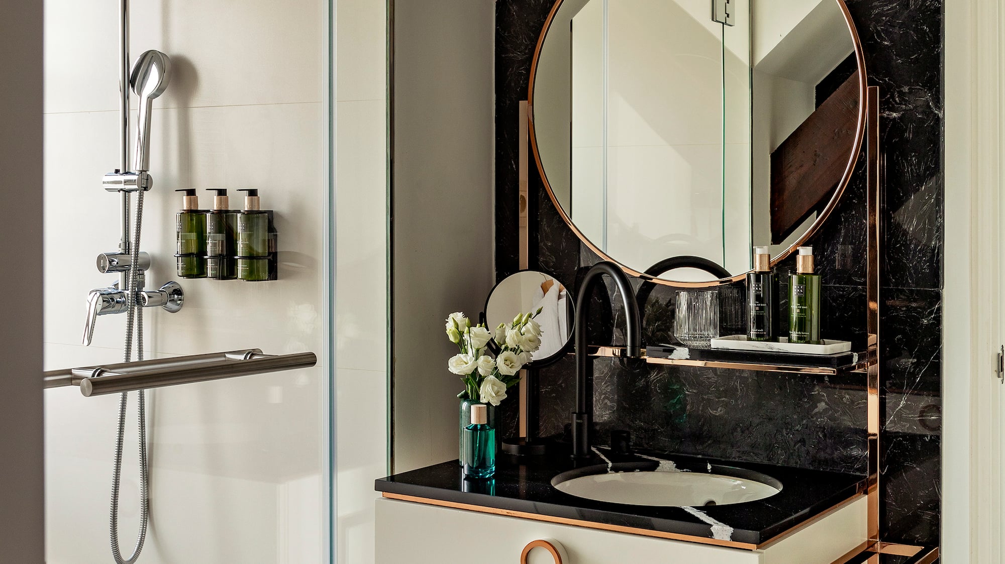 a bathroom with a mirror and a sink
