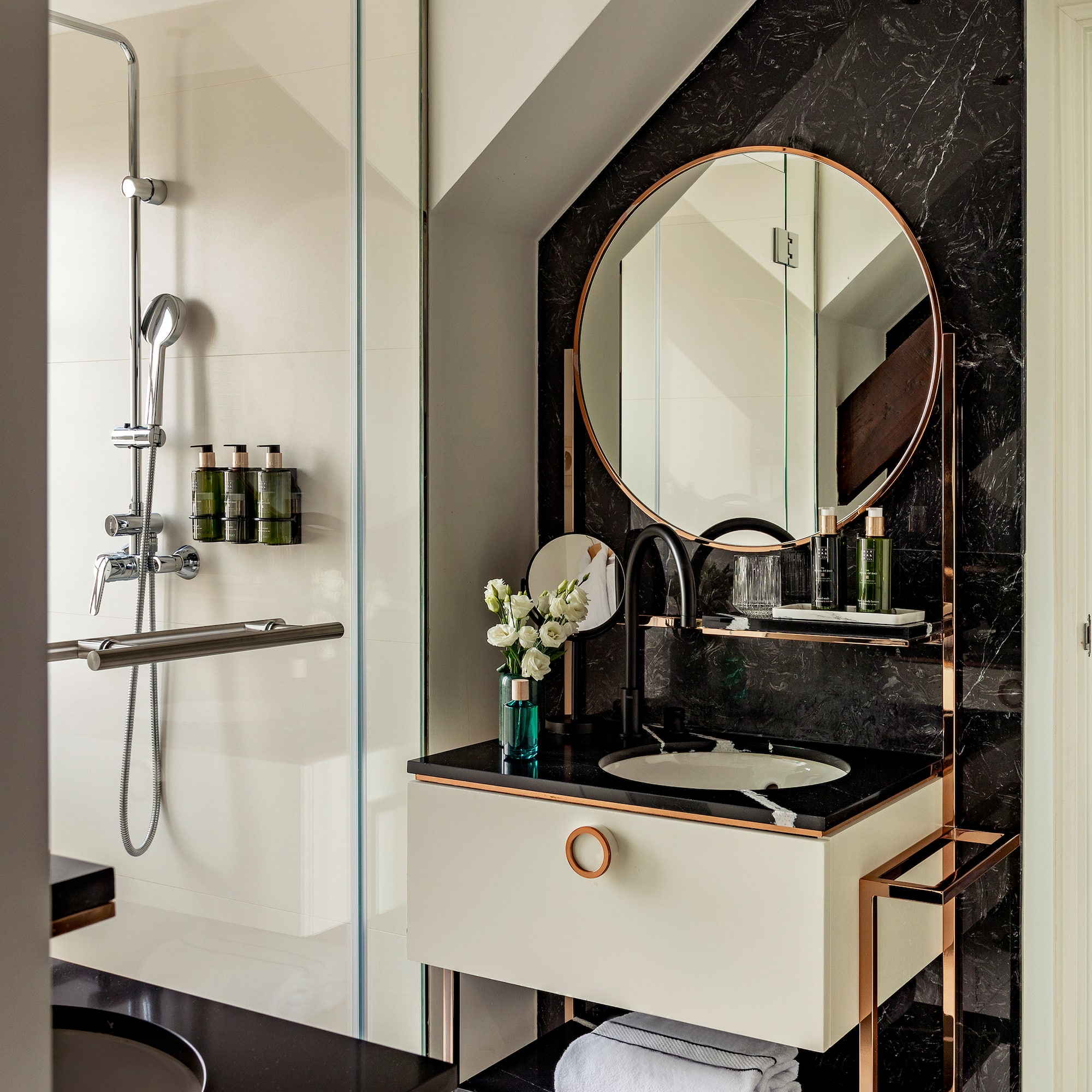 a bathroom with a mirror and a sink