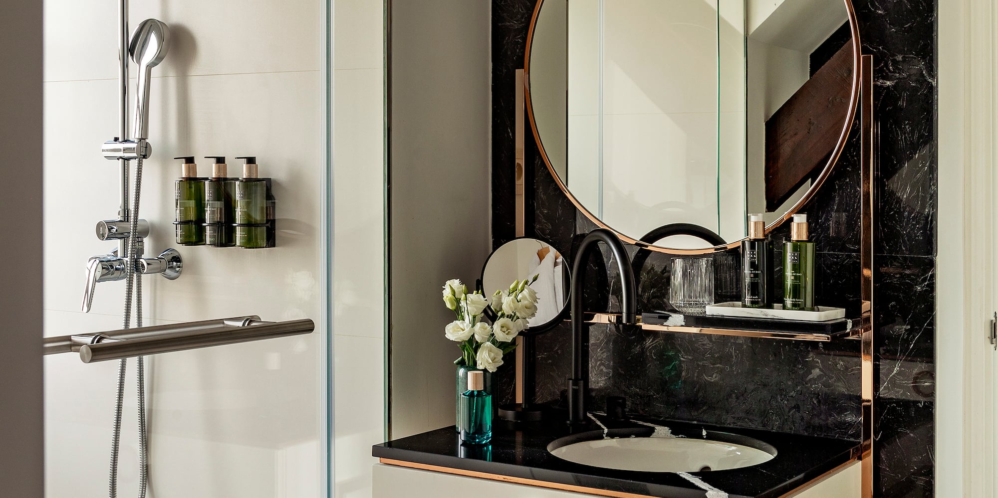 a bathroom with a mirror and a sink