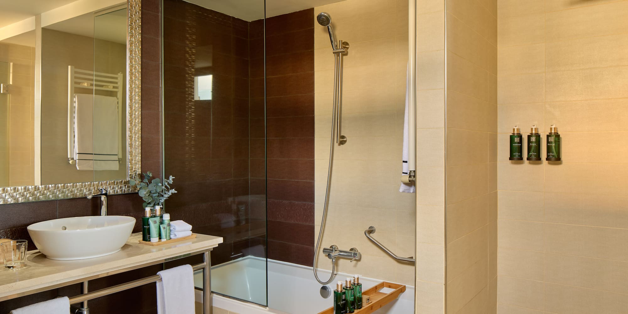 a bathroom with a glass shower door