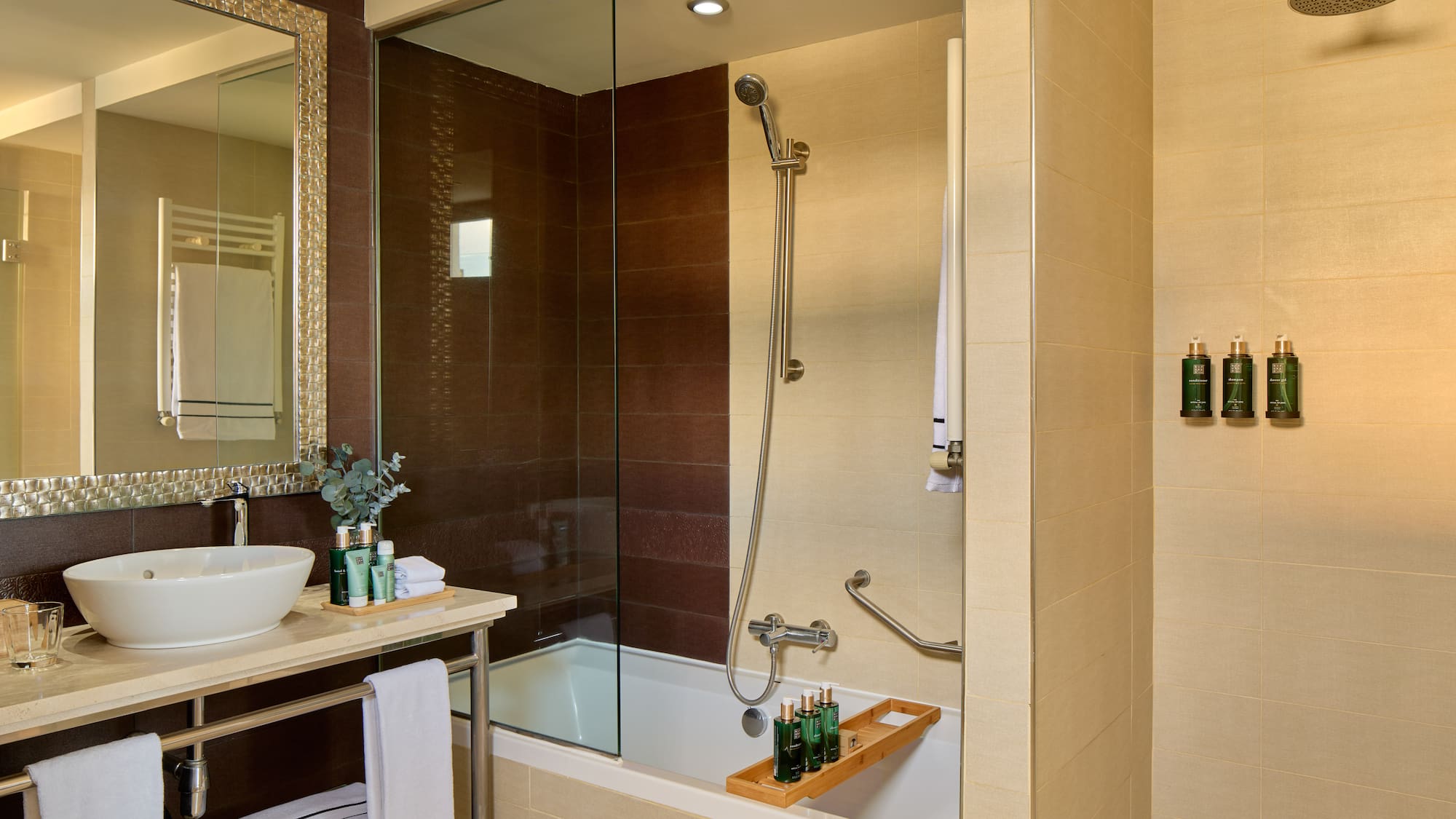 a bathroom with a glass shower door