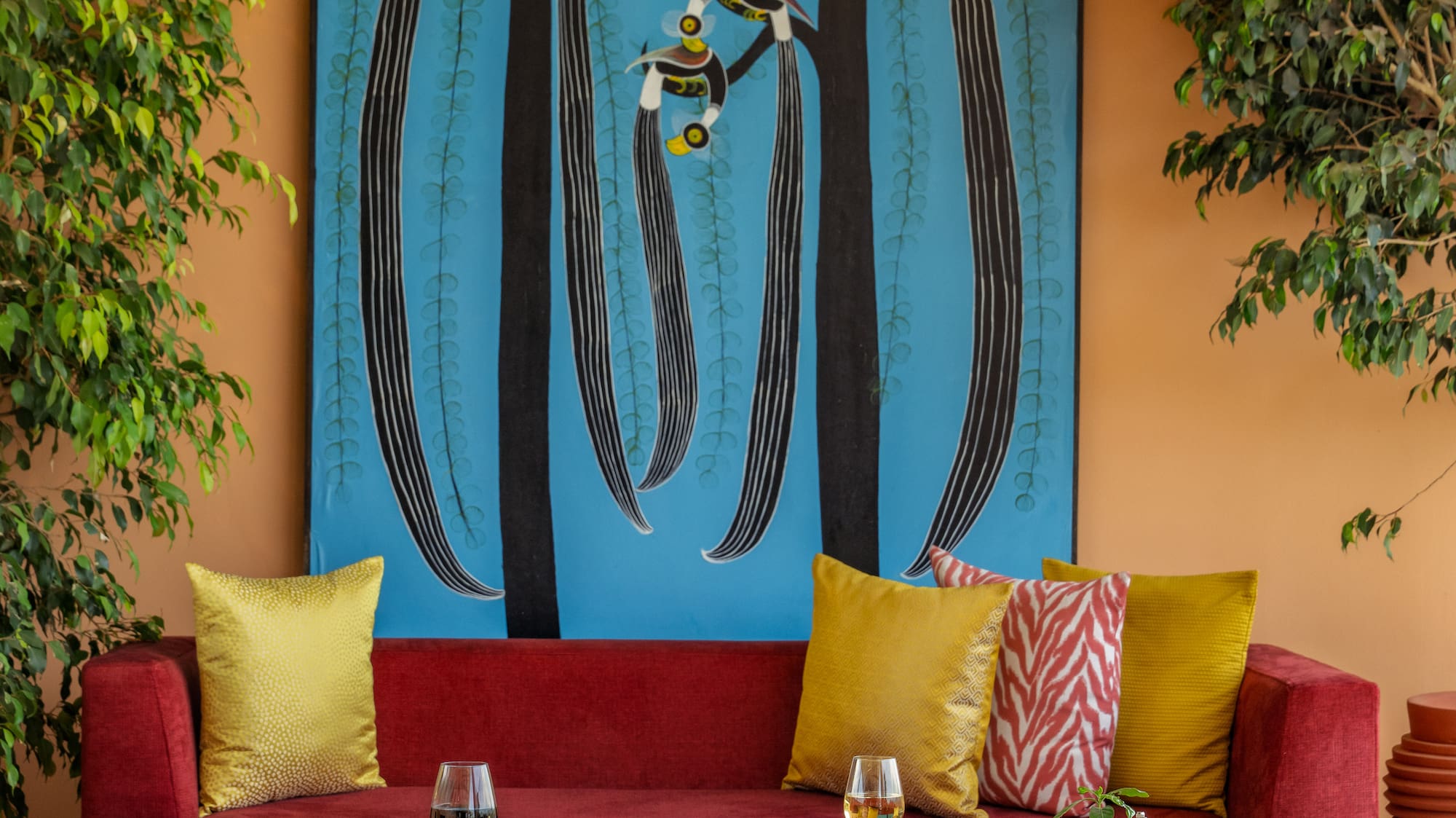 a room with a painting on the wall