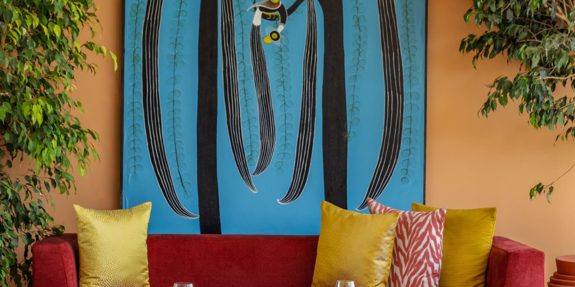 a room with a painting on the wall