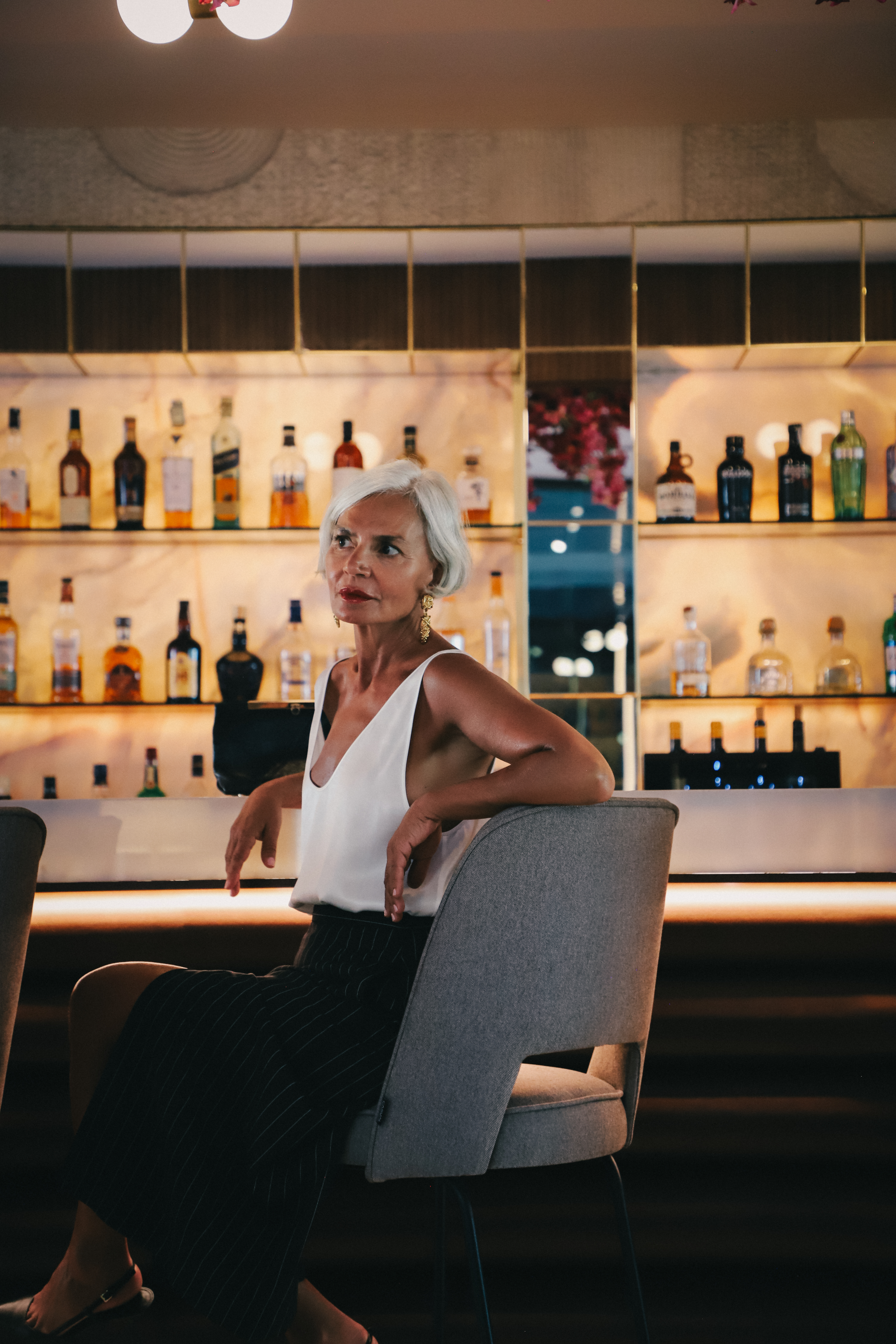 a woman sitting in a chair