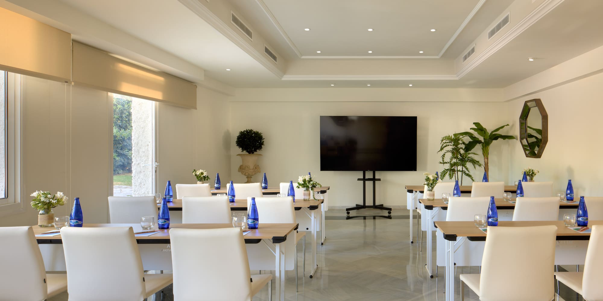 a room with tables and chairs