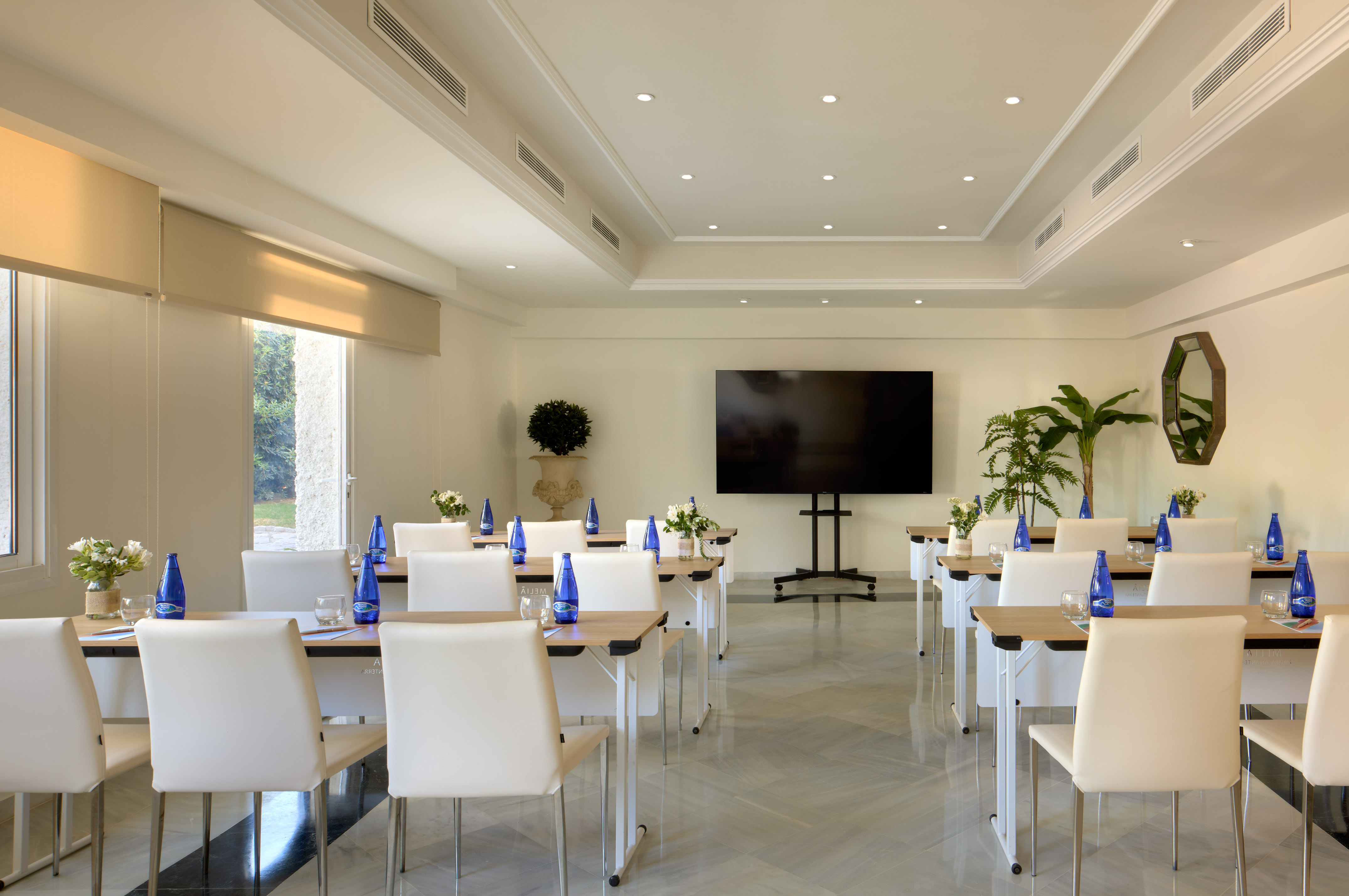 a room with tables and chairs