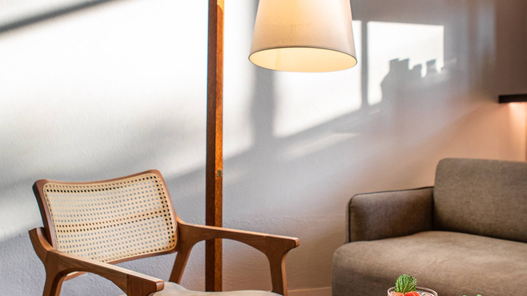 a chair and a lamp in a room