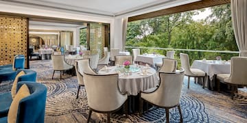 a room with tables and chairs