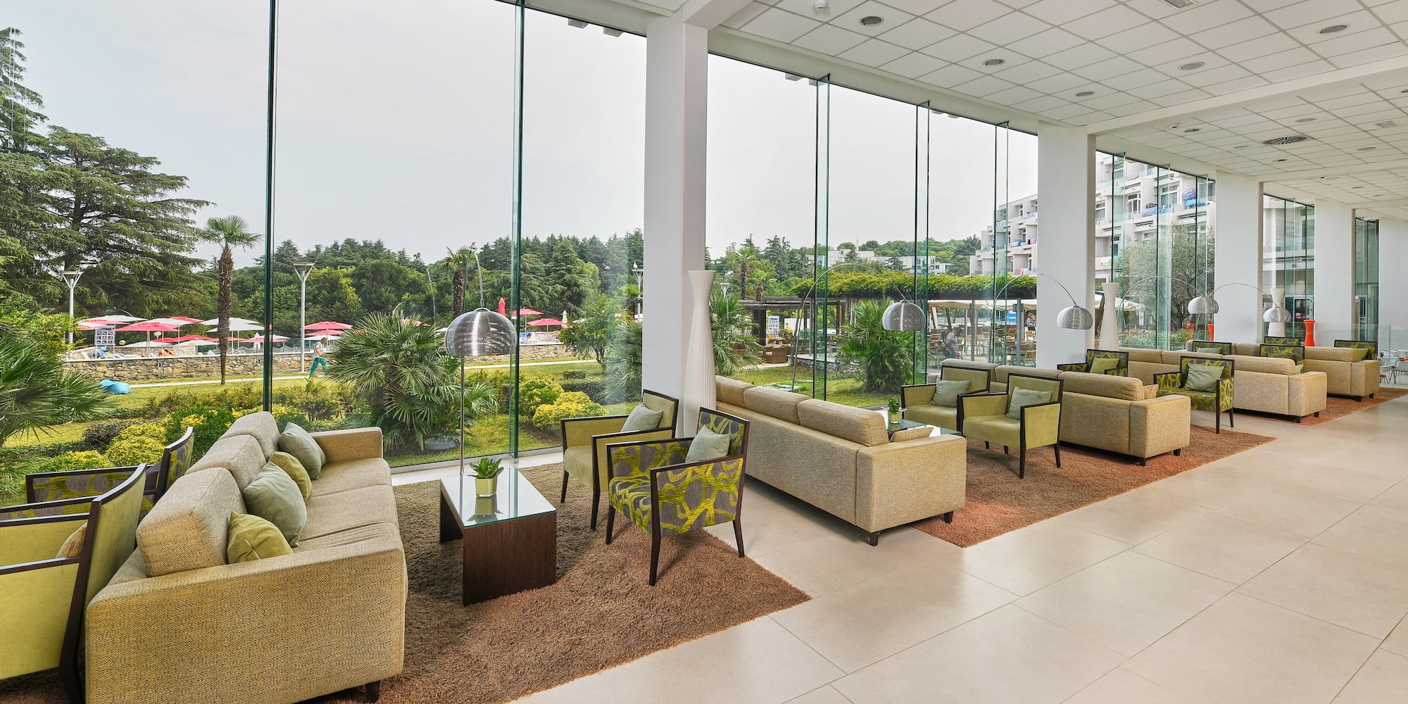 a room with couches and chairs