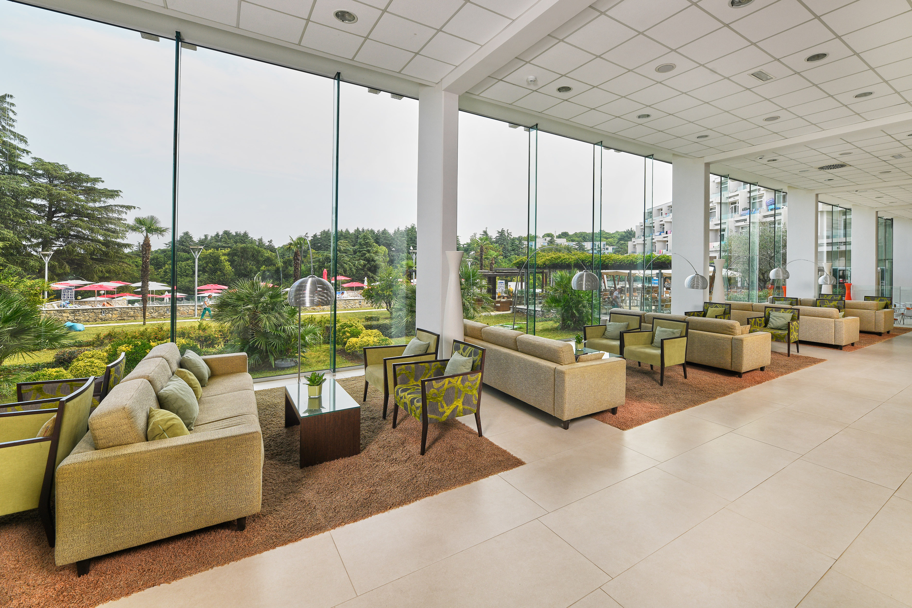 a room with couches and chairs