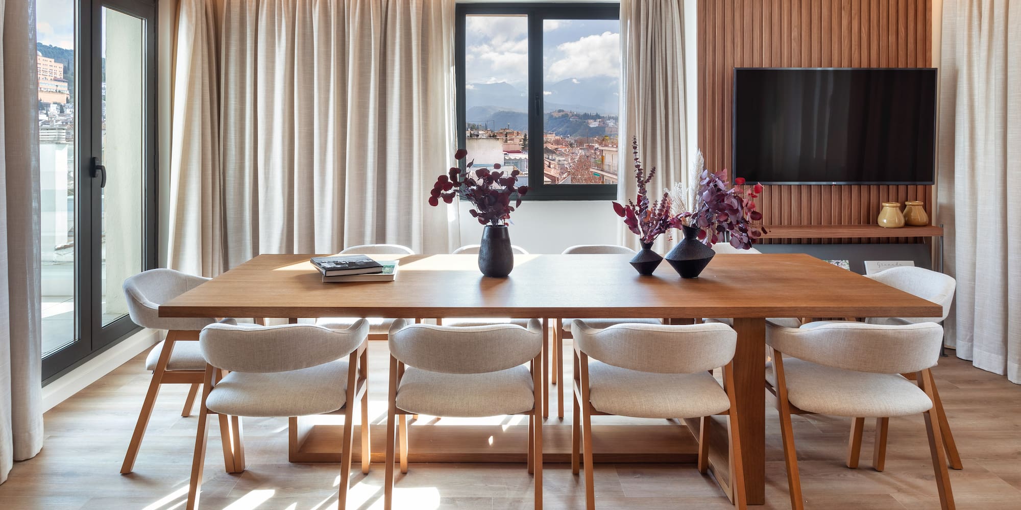 a room with a table and chairs