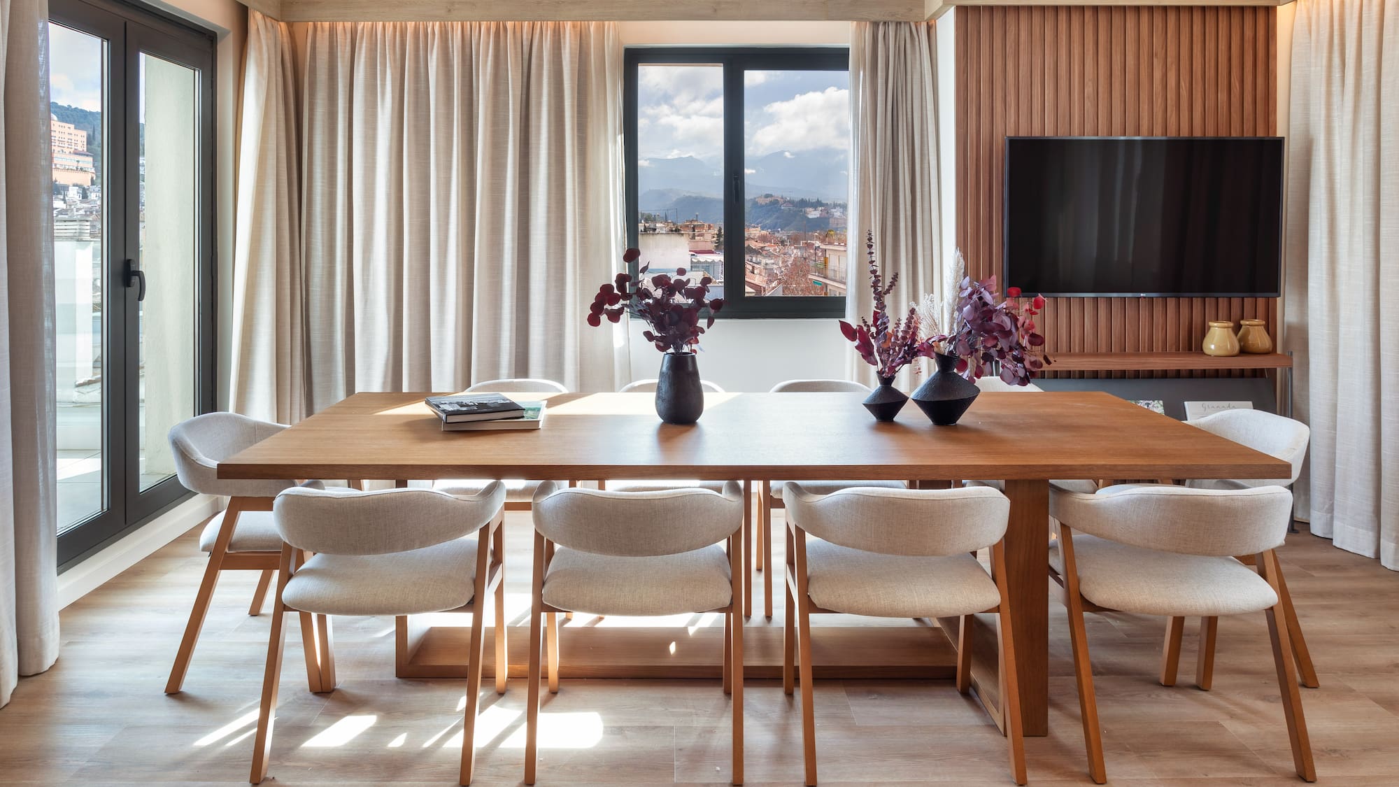 a room with a table and chairs