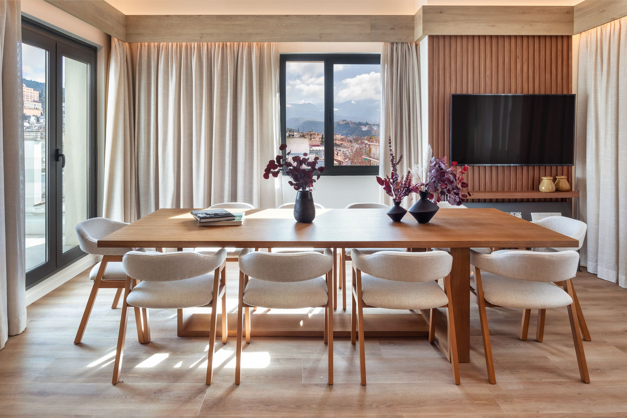 a room with a table and chairs