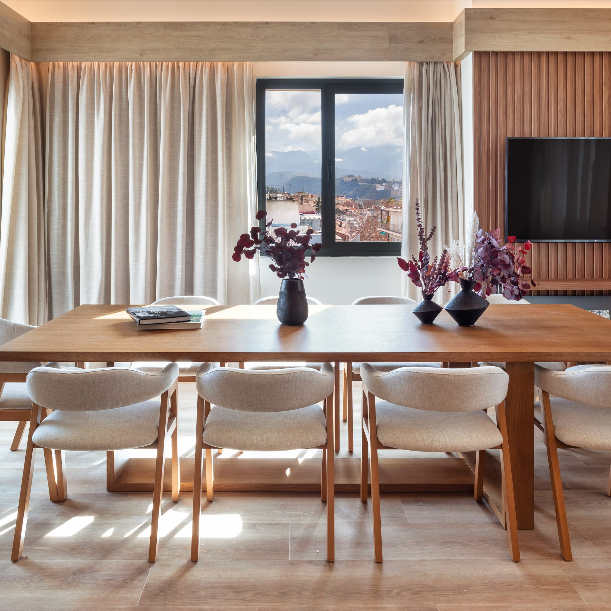 a room with a table and chairs