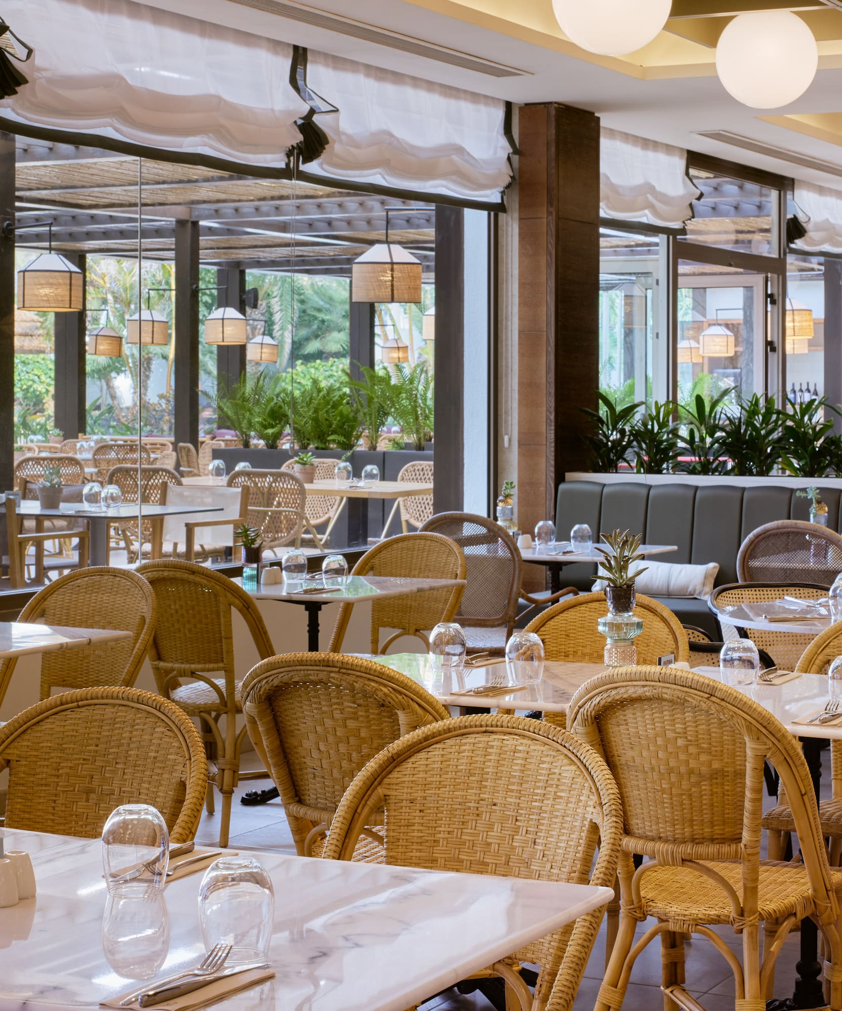 a restaurant with tables and chairs