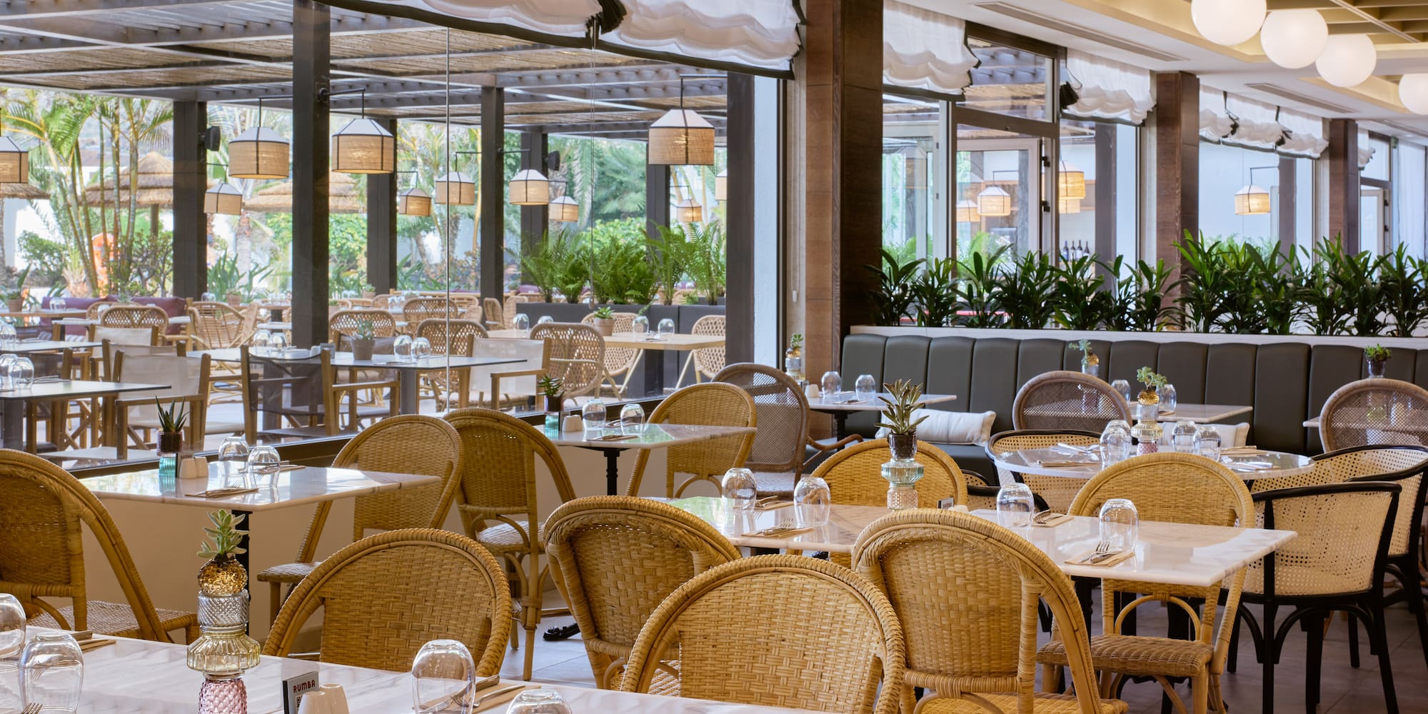 a restaurant with tables and chairs