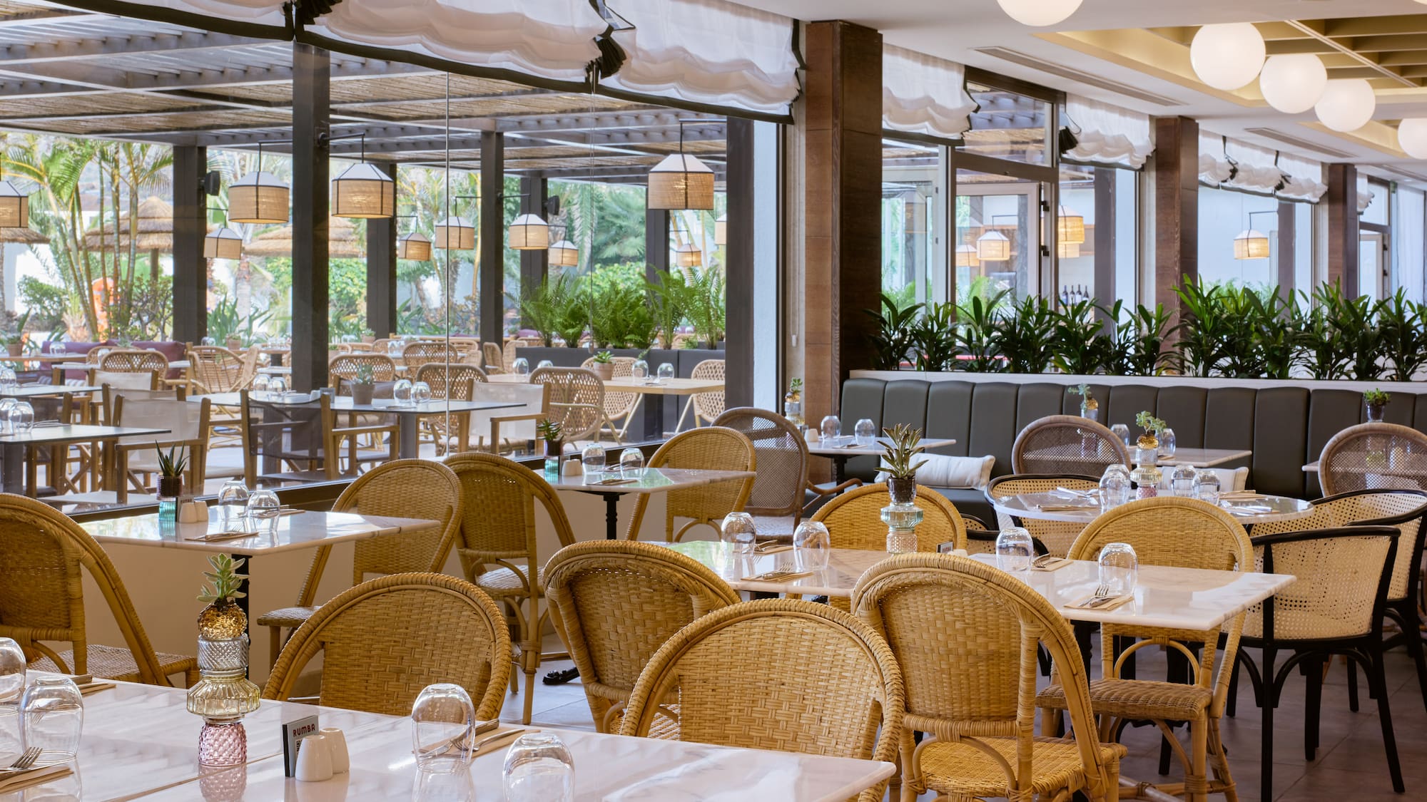 a restaurant with tables and chairs