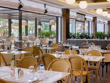 a restaurant with tables and chairs