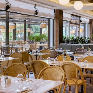 a restaurant with tables and chairs