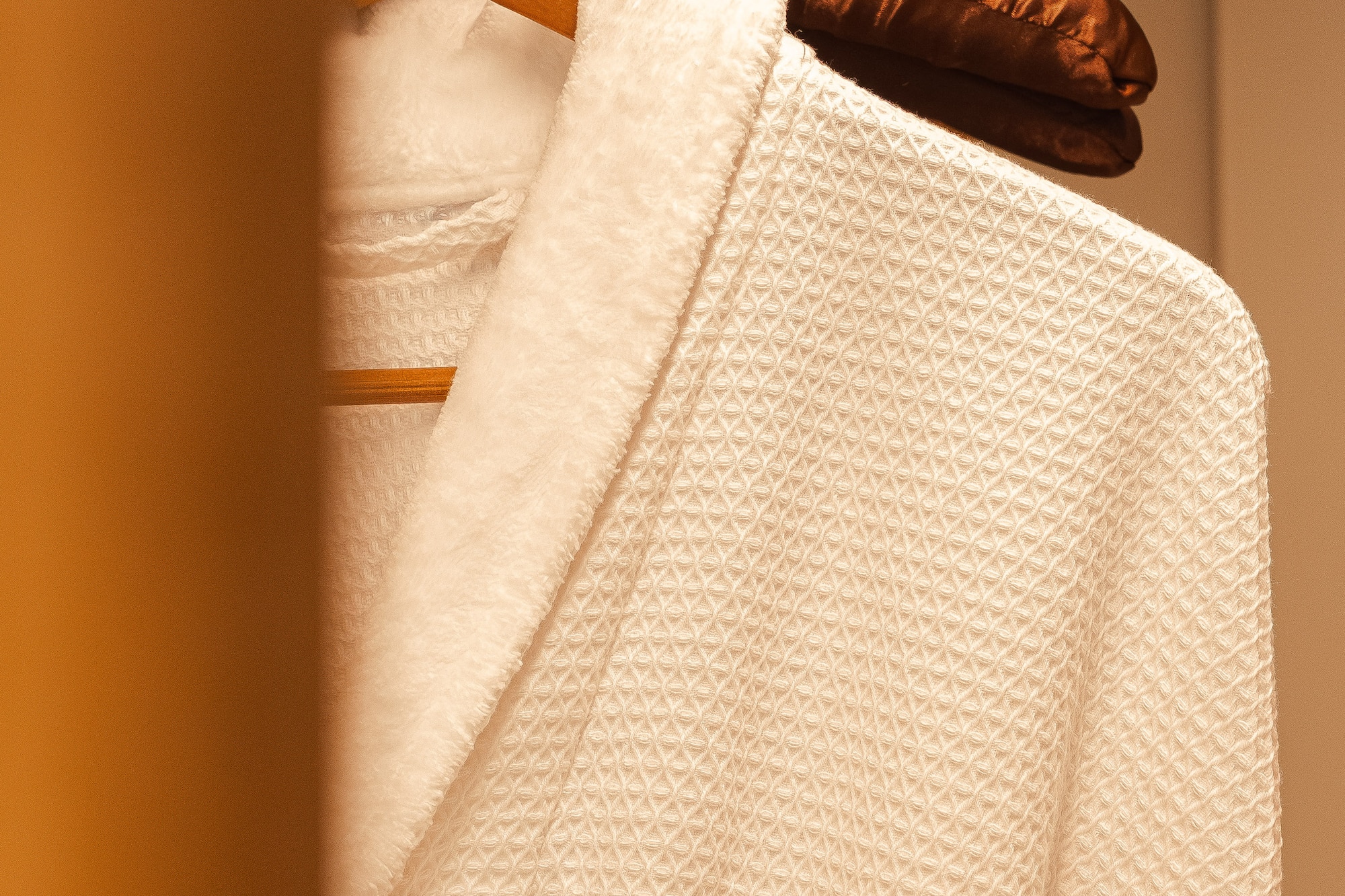 a white robe on a swinger