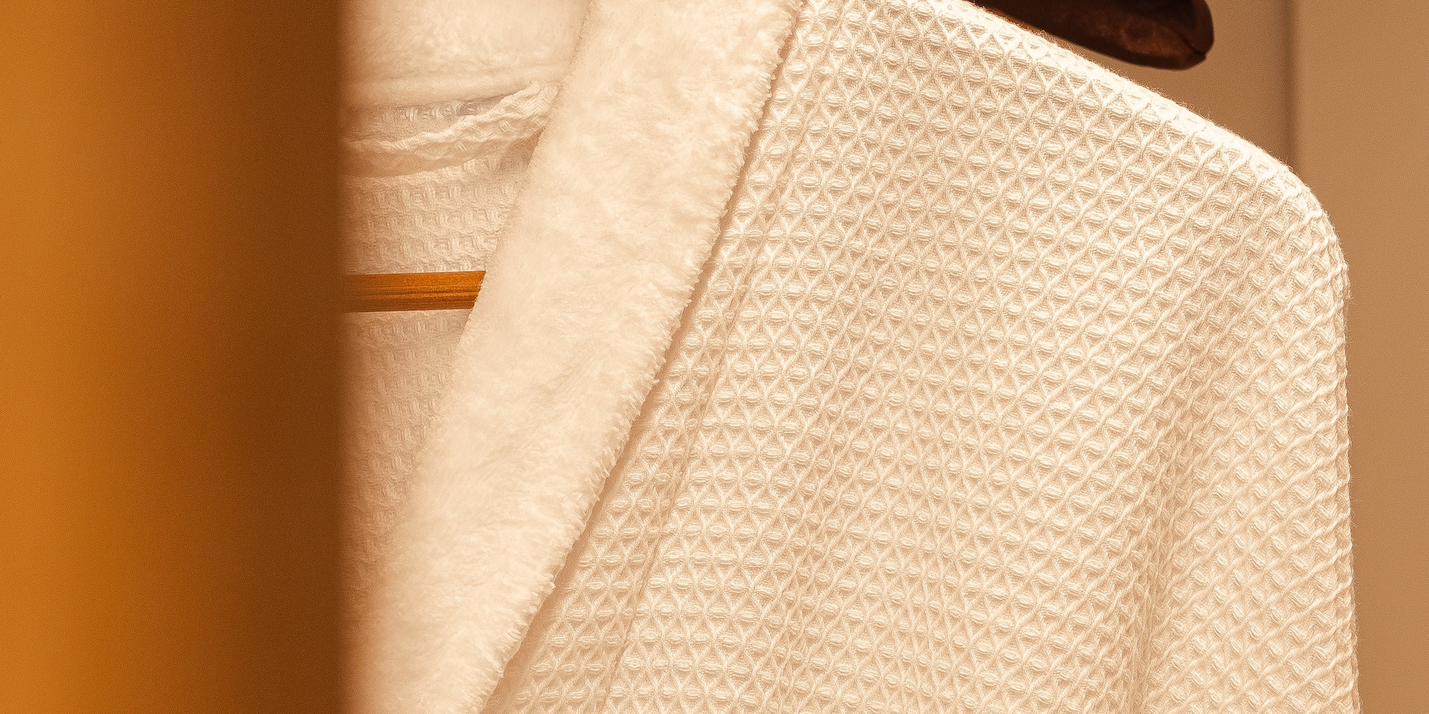 a white robe on a swinger