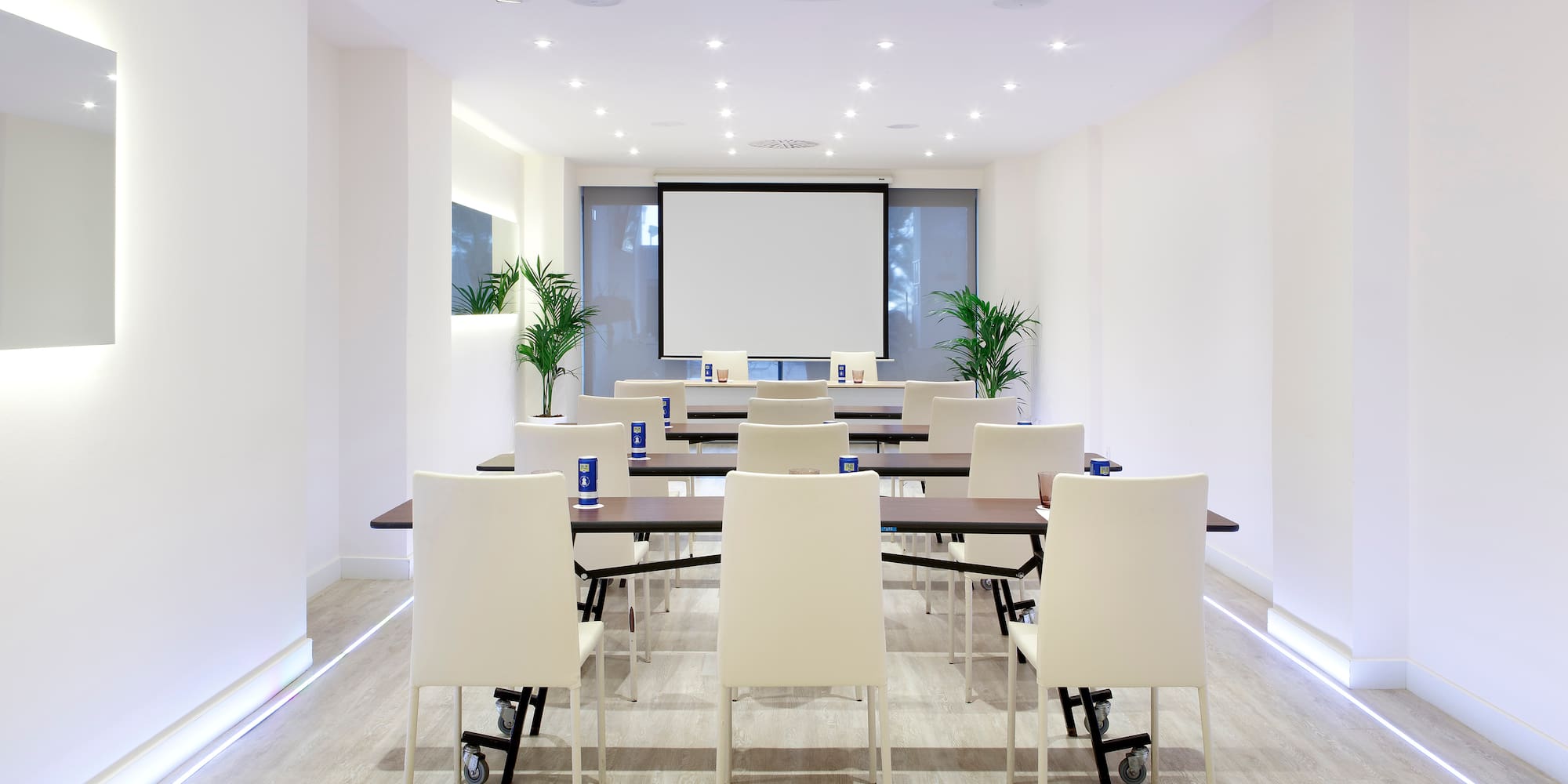 a room with tables and chairs