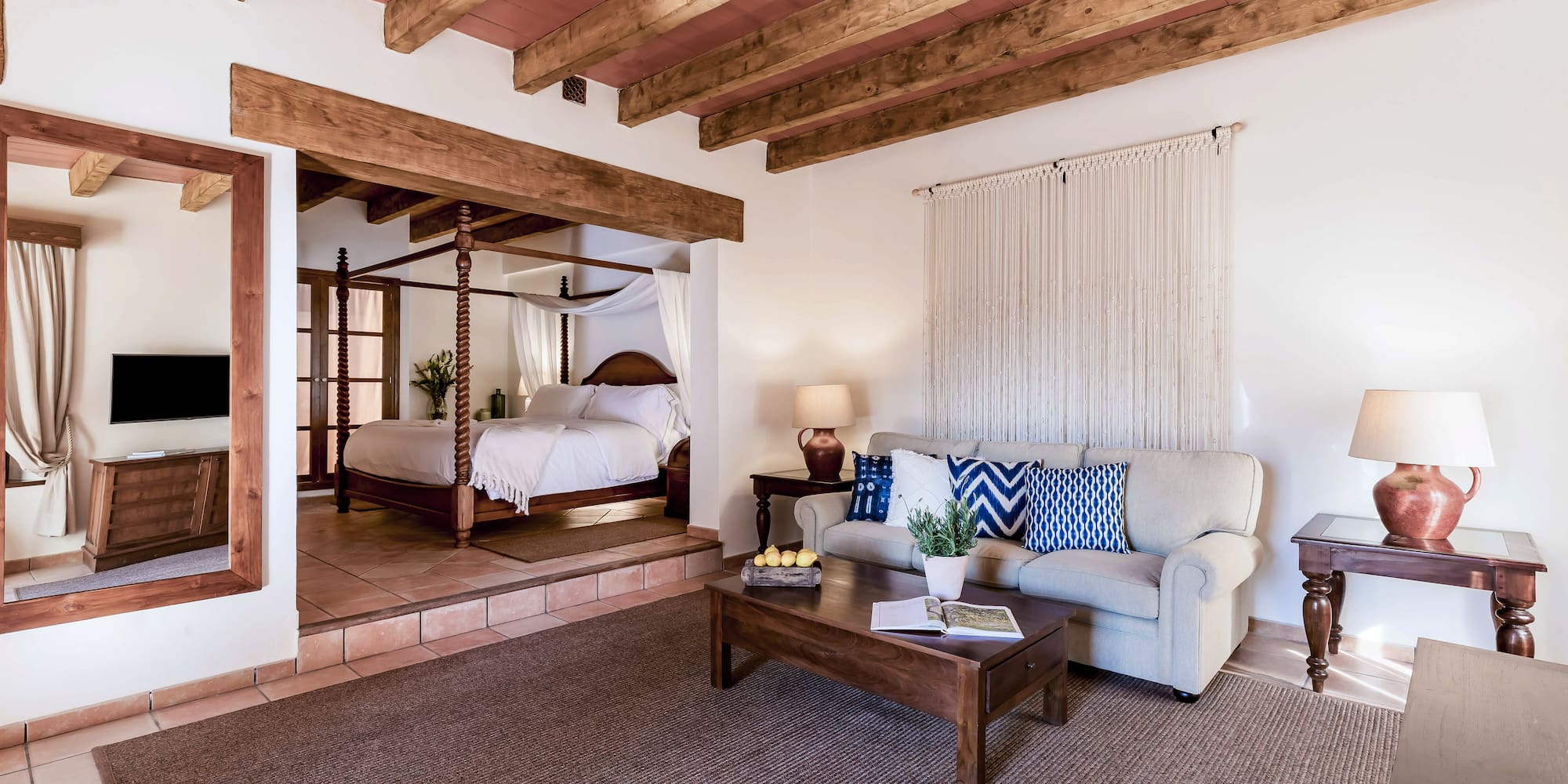 a room with a bed and a couch