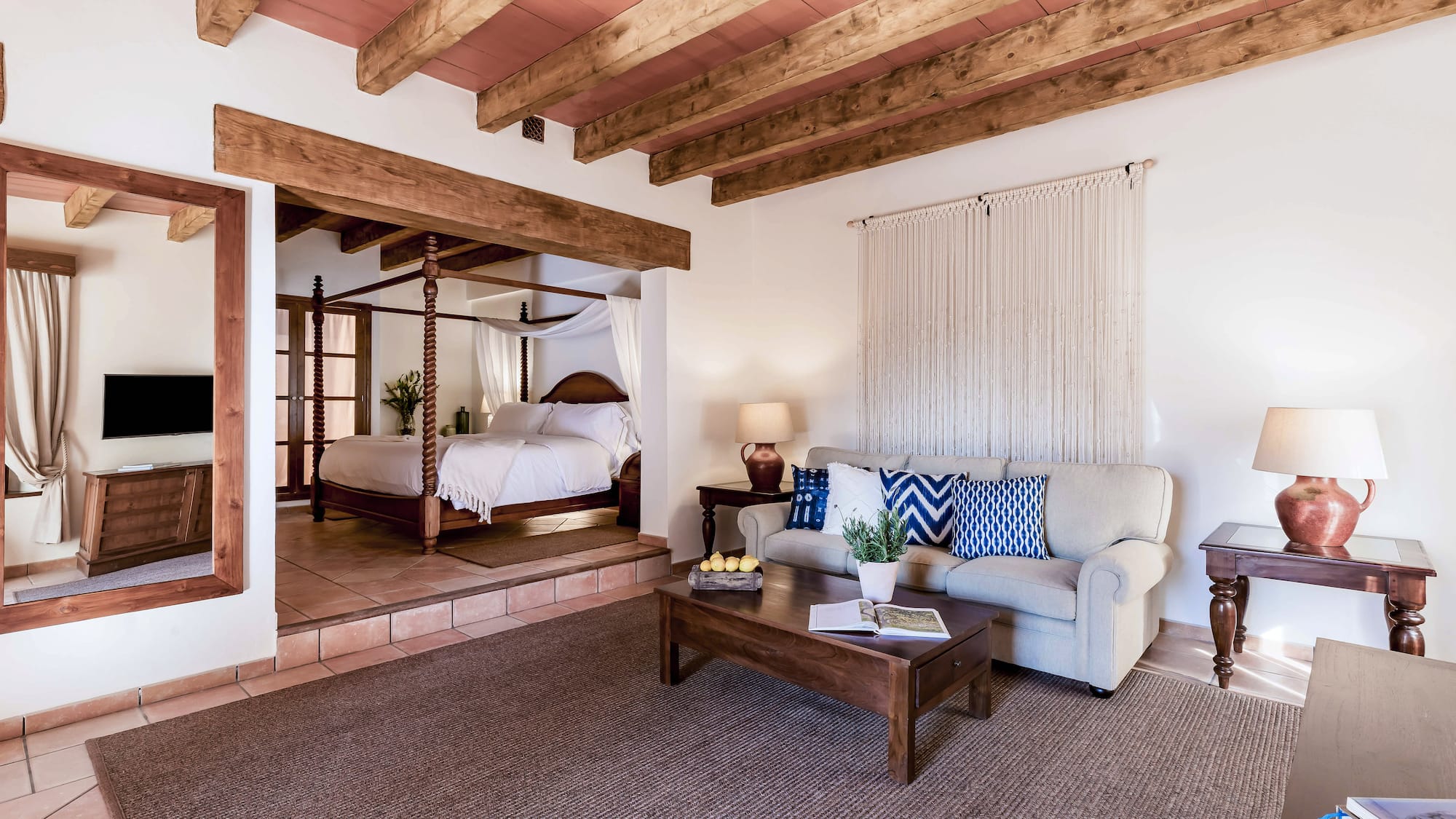 a room with a bed and a couch