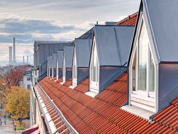 a roof of a building with windows