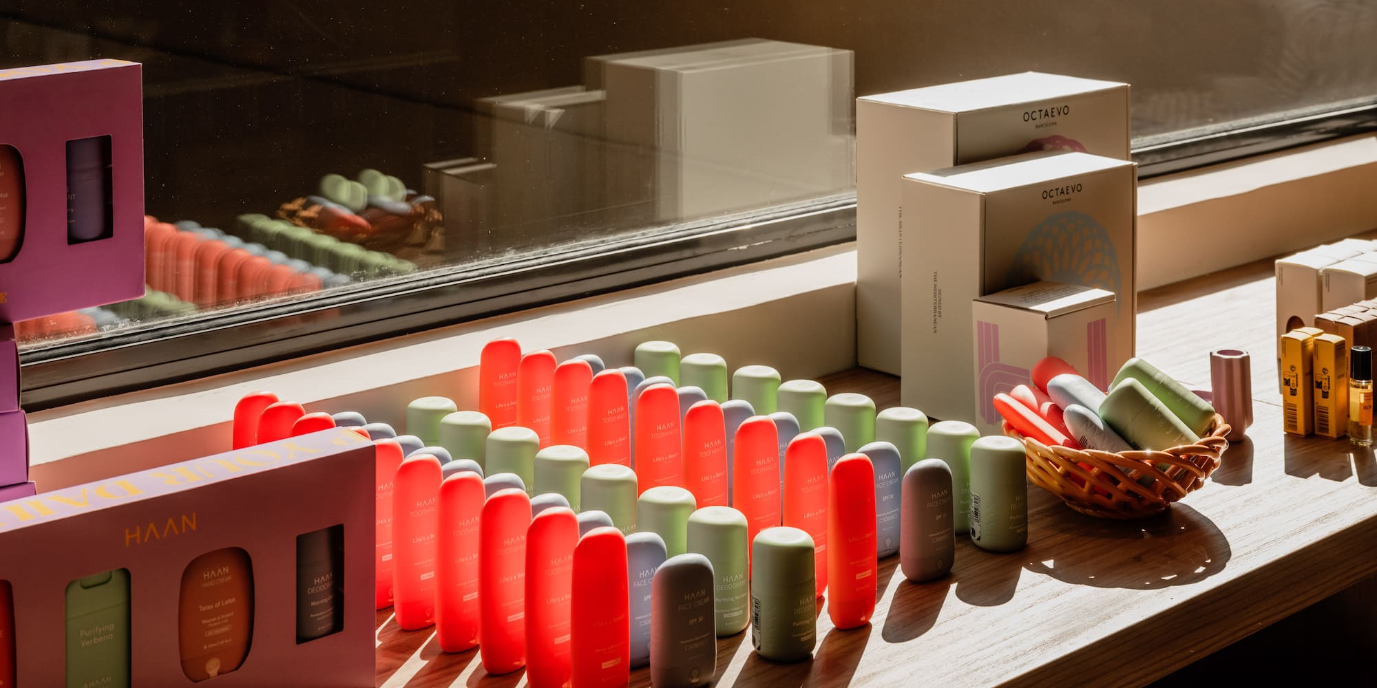 a group of colorful objects on a window sill