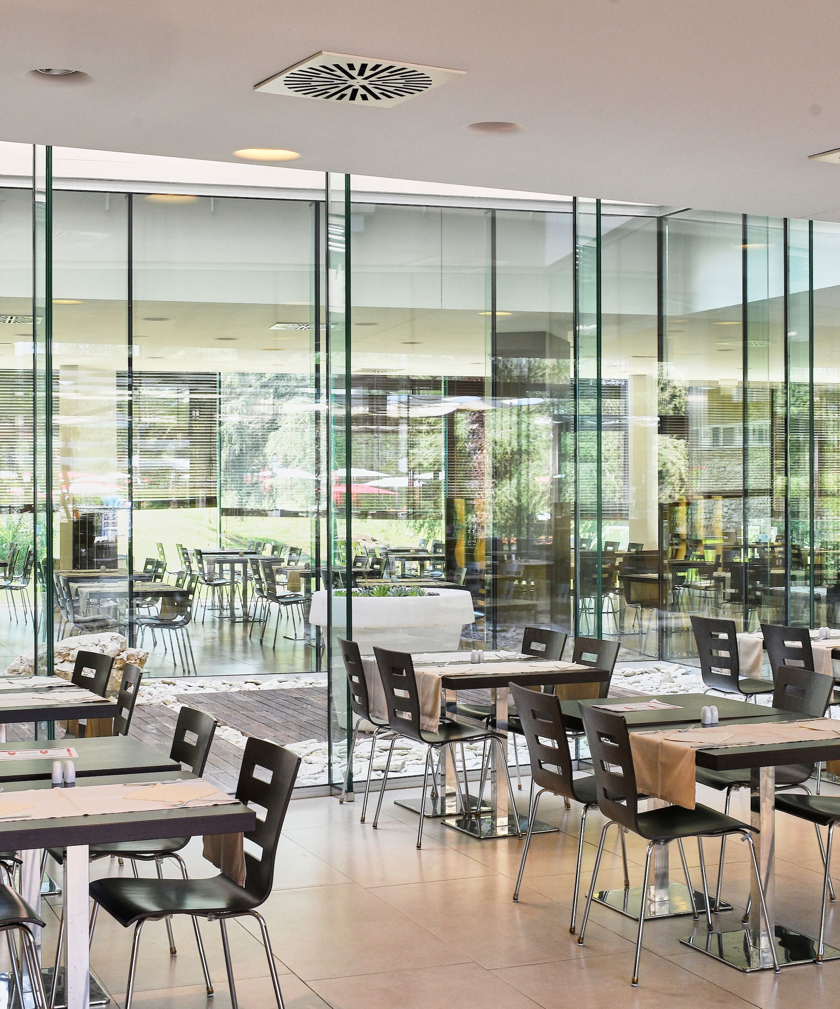 a room with tables and chairs